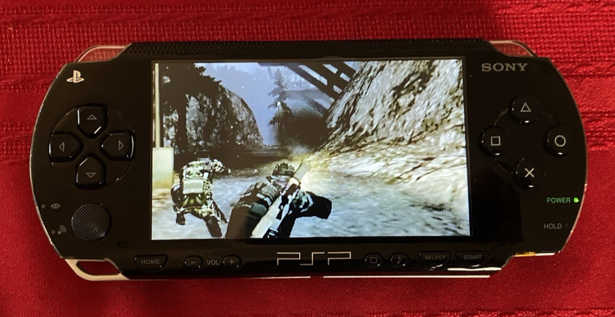 Sony PSP 1001 PlayStation Portable Handheld Console with 4 Games & Case TESTED