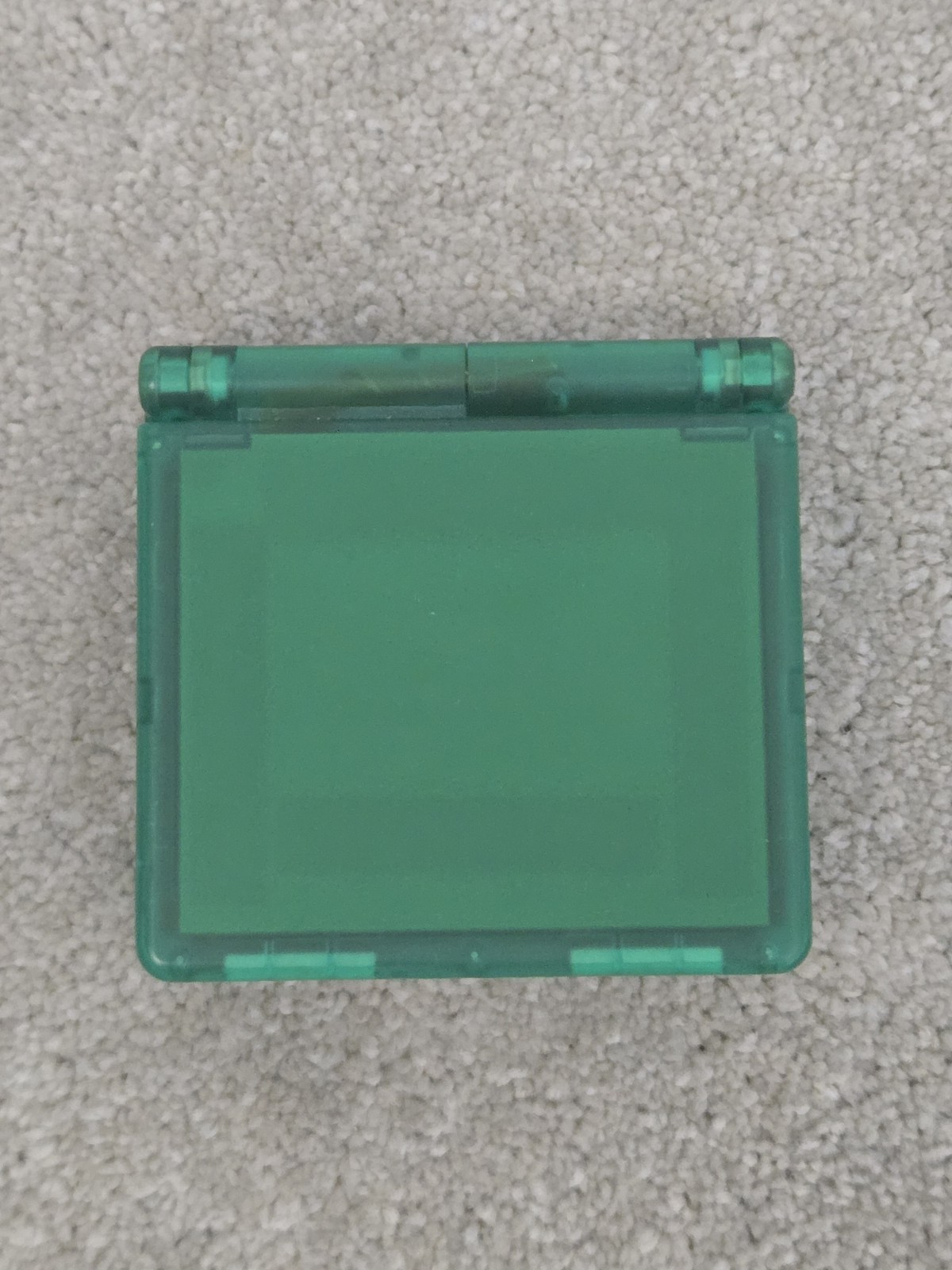 Anbernic game console RG35XXSP retro handheld transparent green tested arcade