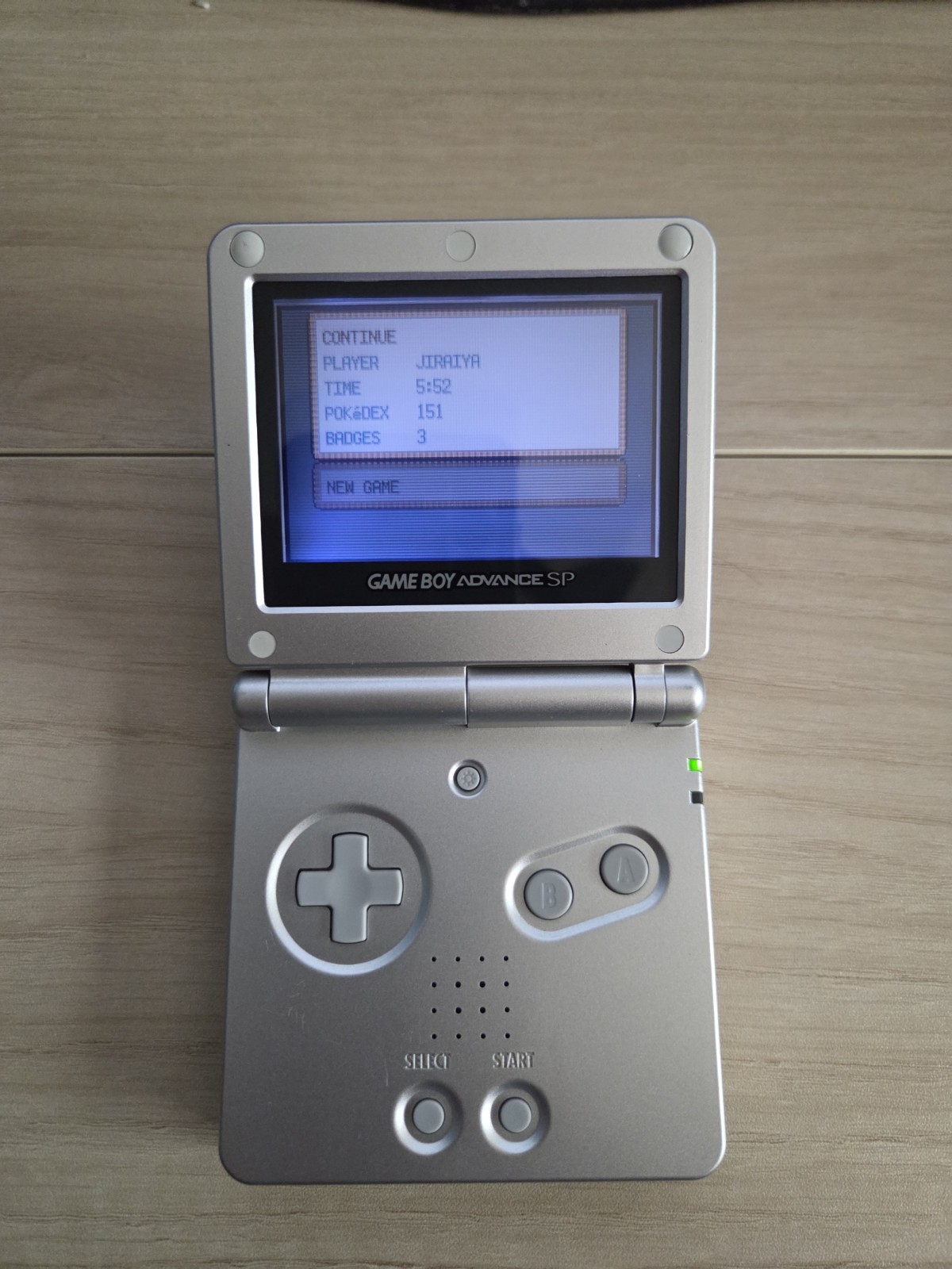 Platinum Nintendo Game Boy Advance SP (AGS-001) CIB with Pokémon Leaf Green