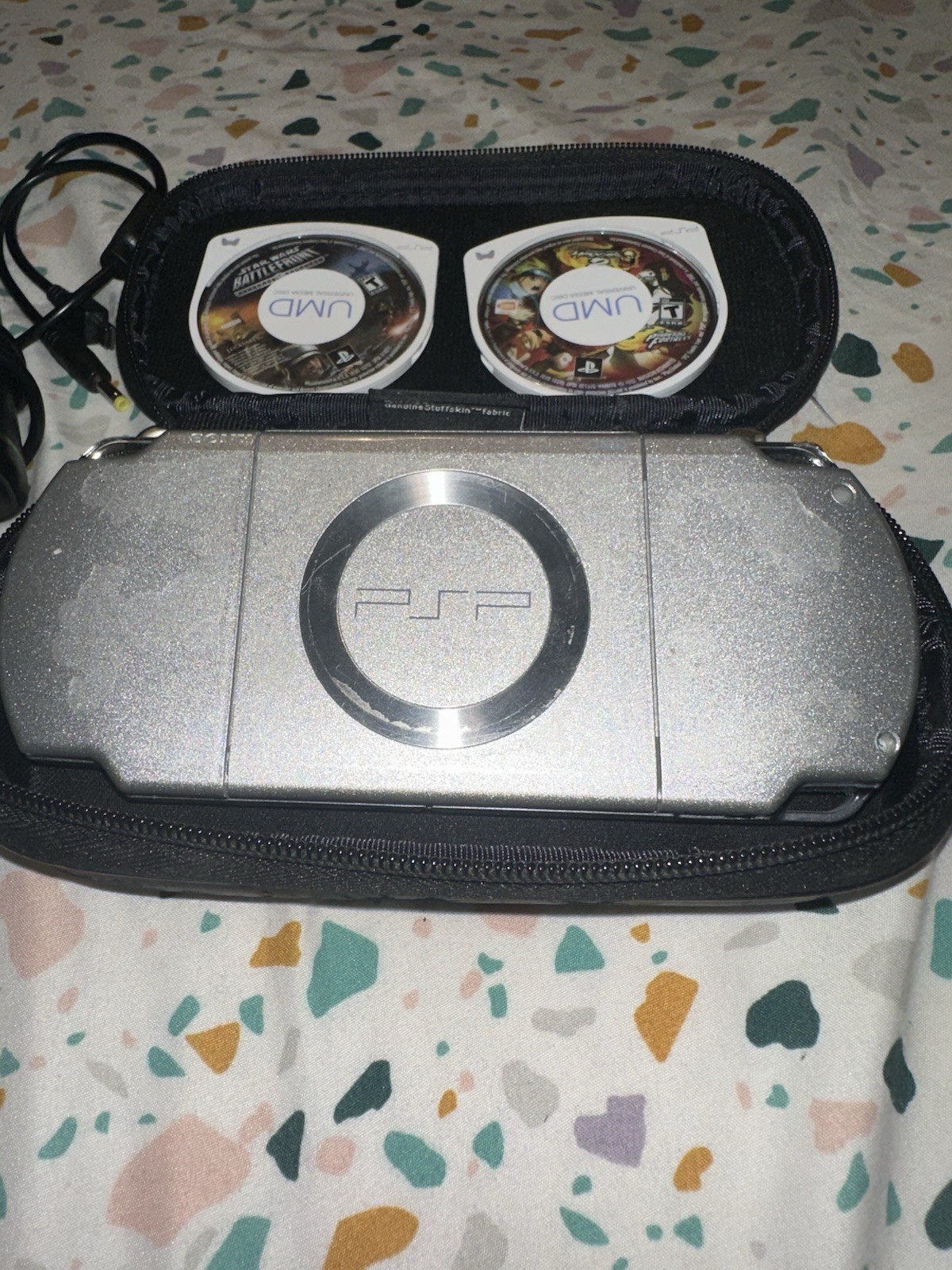 PSP 2001 Silver CONSOLE W/2 Games And Charger Tested
