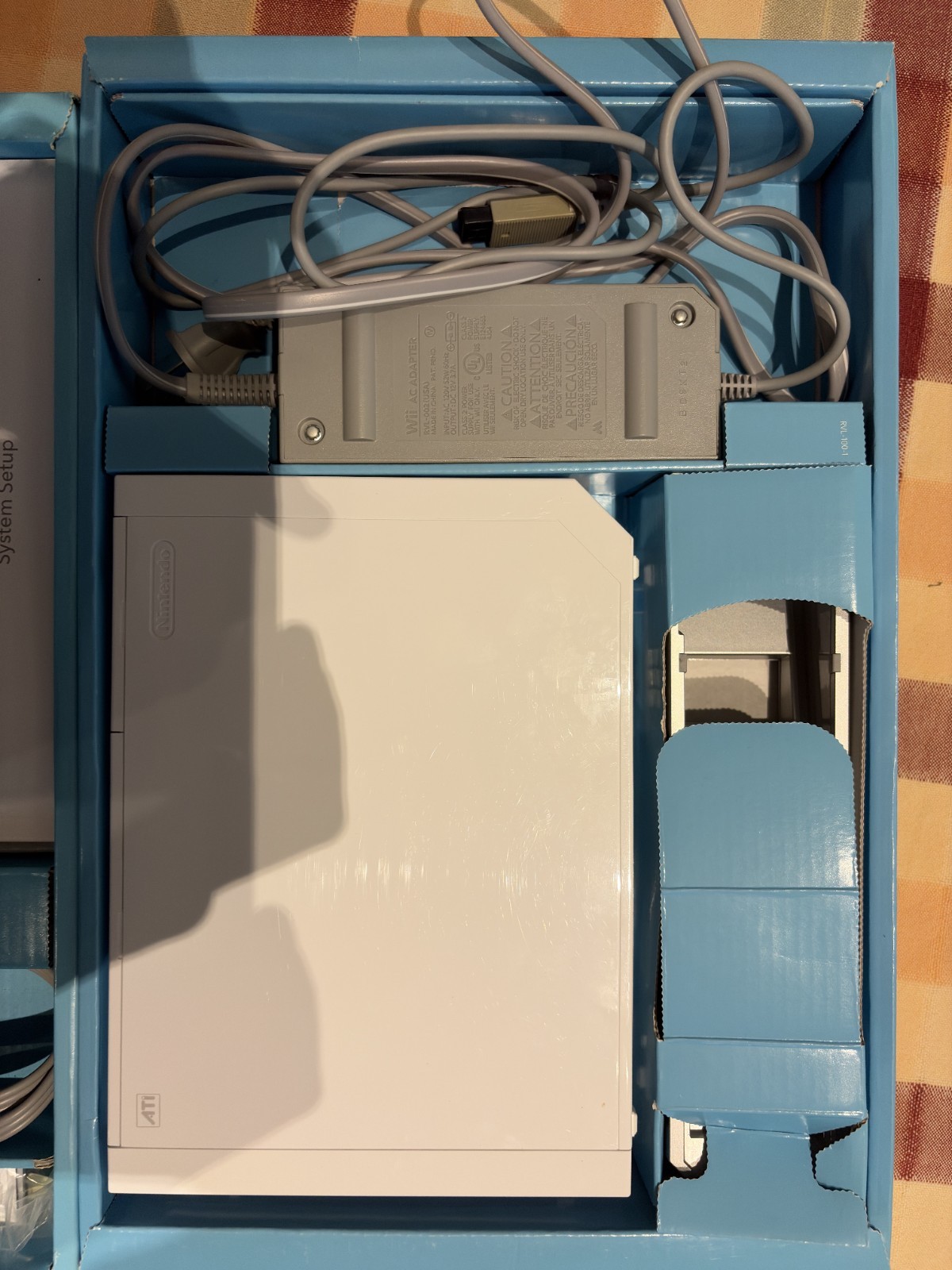 Nintendo Wii with assortment of games bundle – Original Packaging included