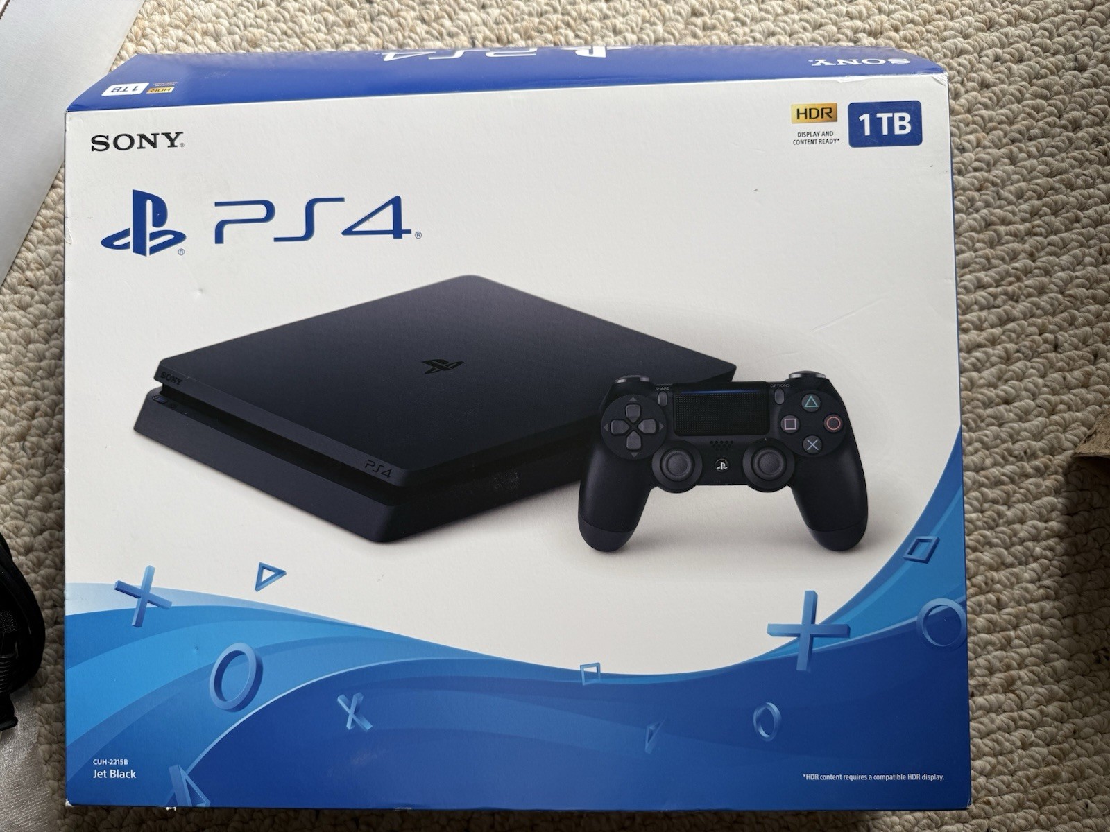 Sony PlayStation 4 Slim Jet Black, 500GB with 2 controllers (1 older model).