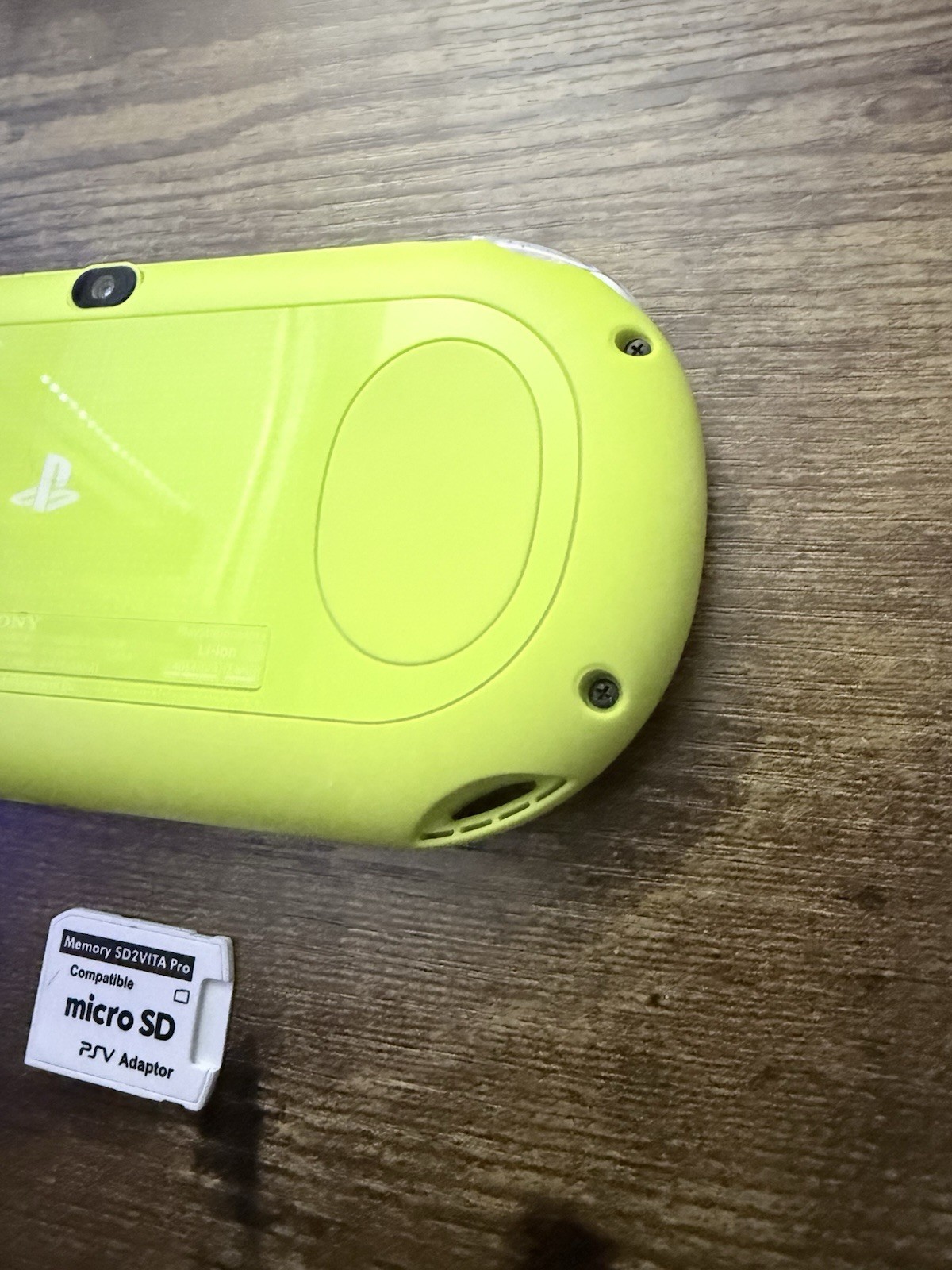 Sony PS Vita 2000 Handheld Console White/Yellow with Wi-Fi micro SD Adapter