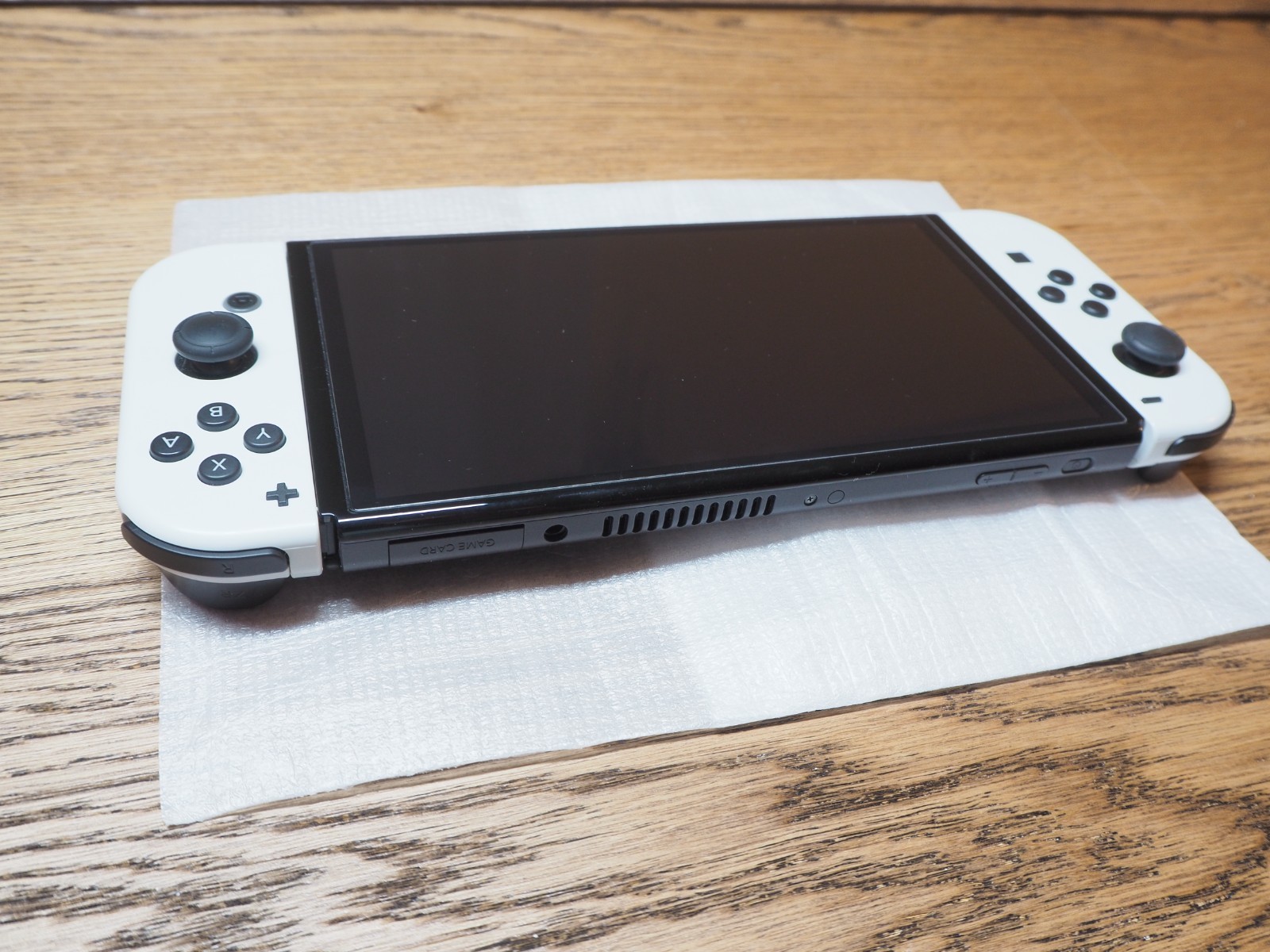 Nintendo Switch OLED Model Handheld Console – 64GB – White with 128GB SD Card