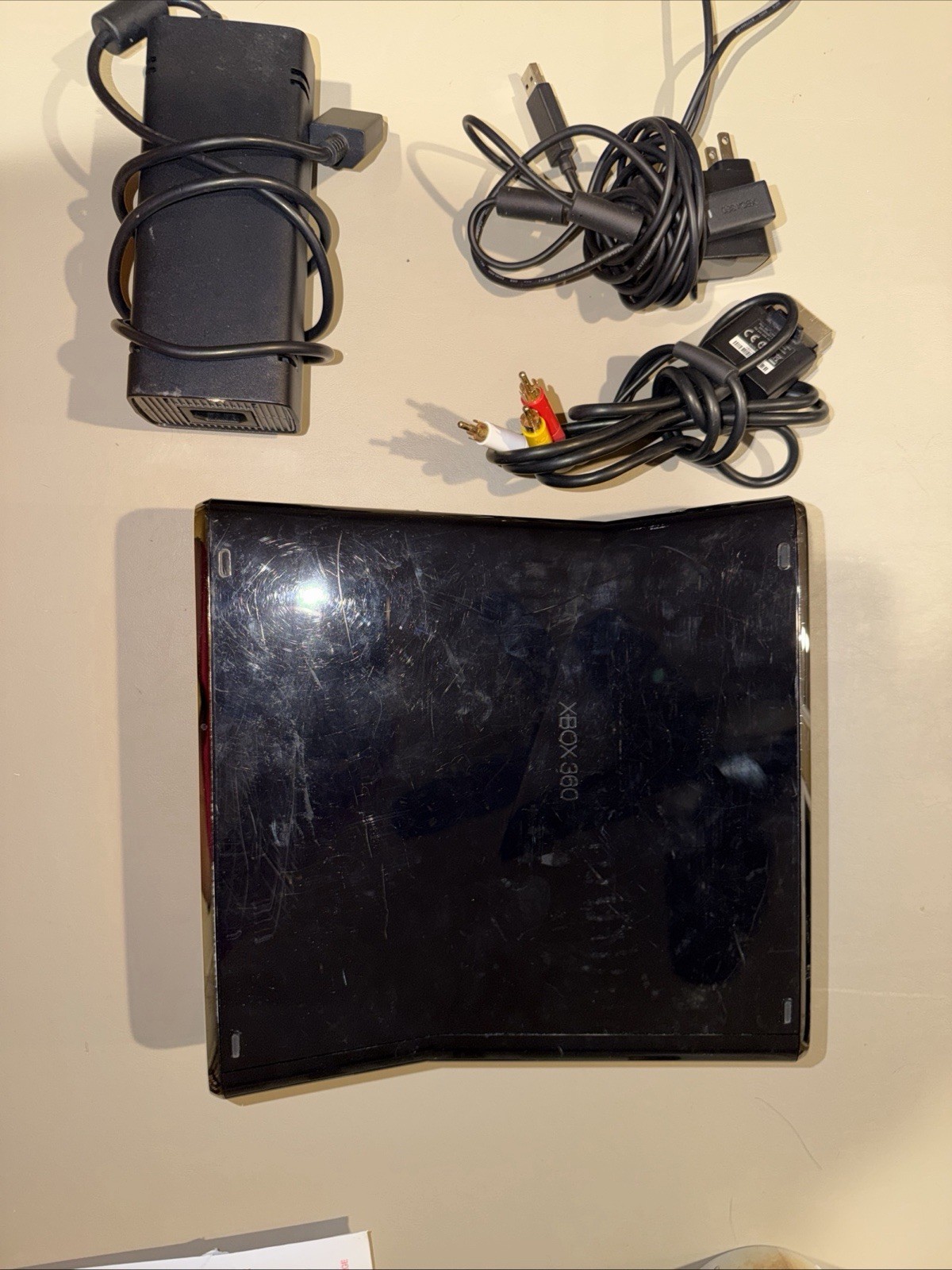 Microsoft Xbox 360 Slim 250GB Black Console, White Controller And Cords(NTSC)