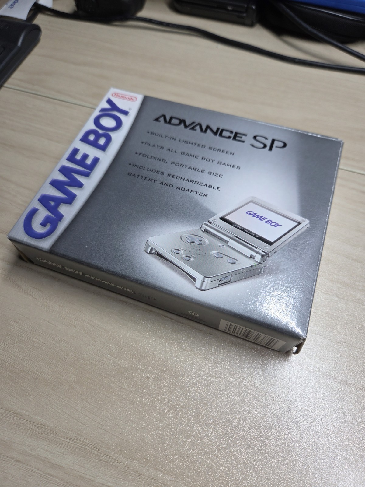 Platinum Nintendo Game Boy Advance SP (AGS-001) CIB with Pokémon Leaf Green
