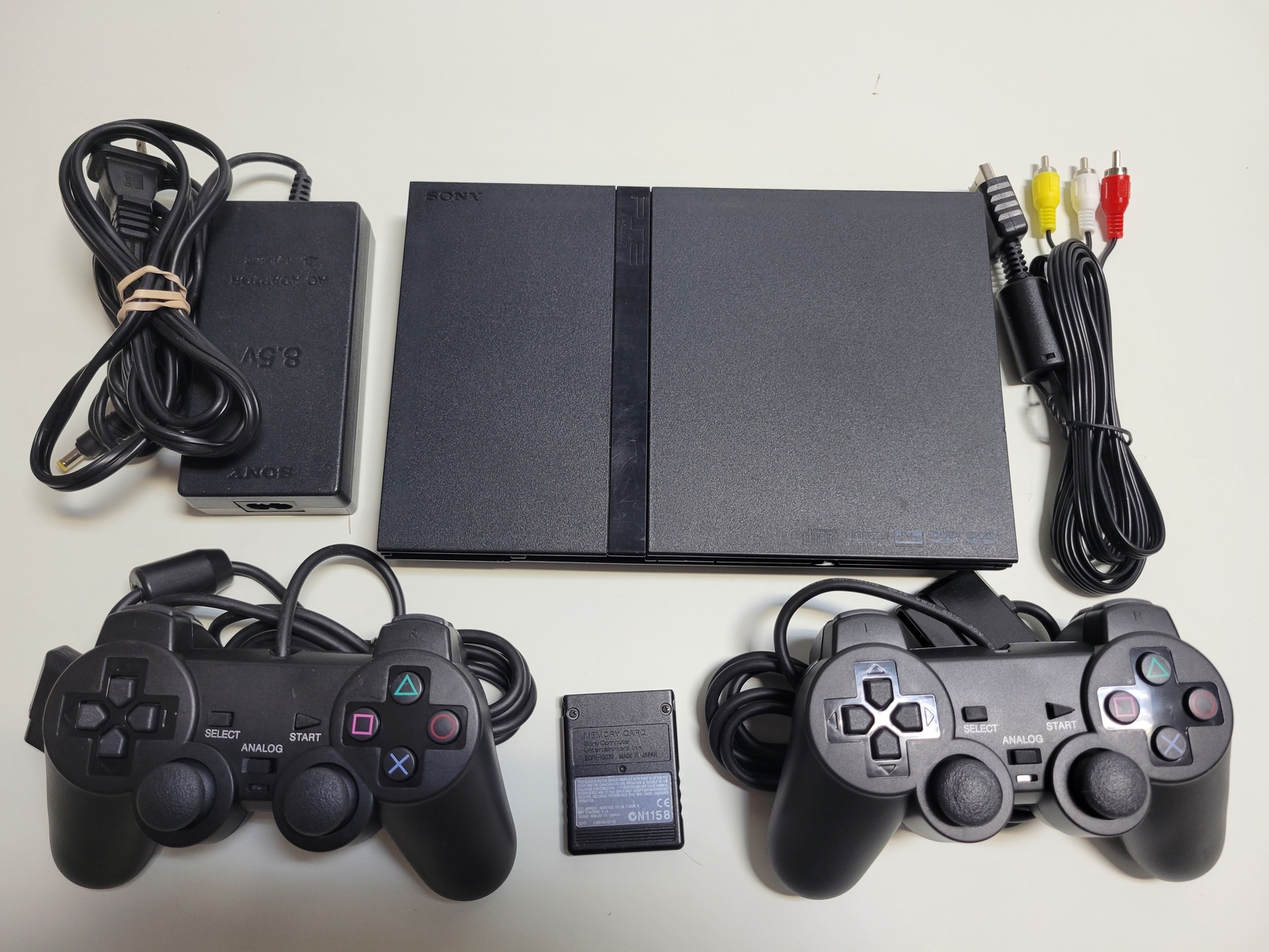 GUARANTEED Slim Playstation 2 Console PS2 – 2 BRAND NEW Controllers VG PS1 Compa