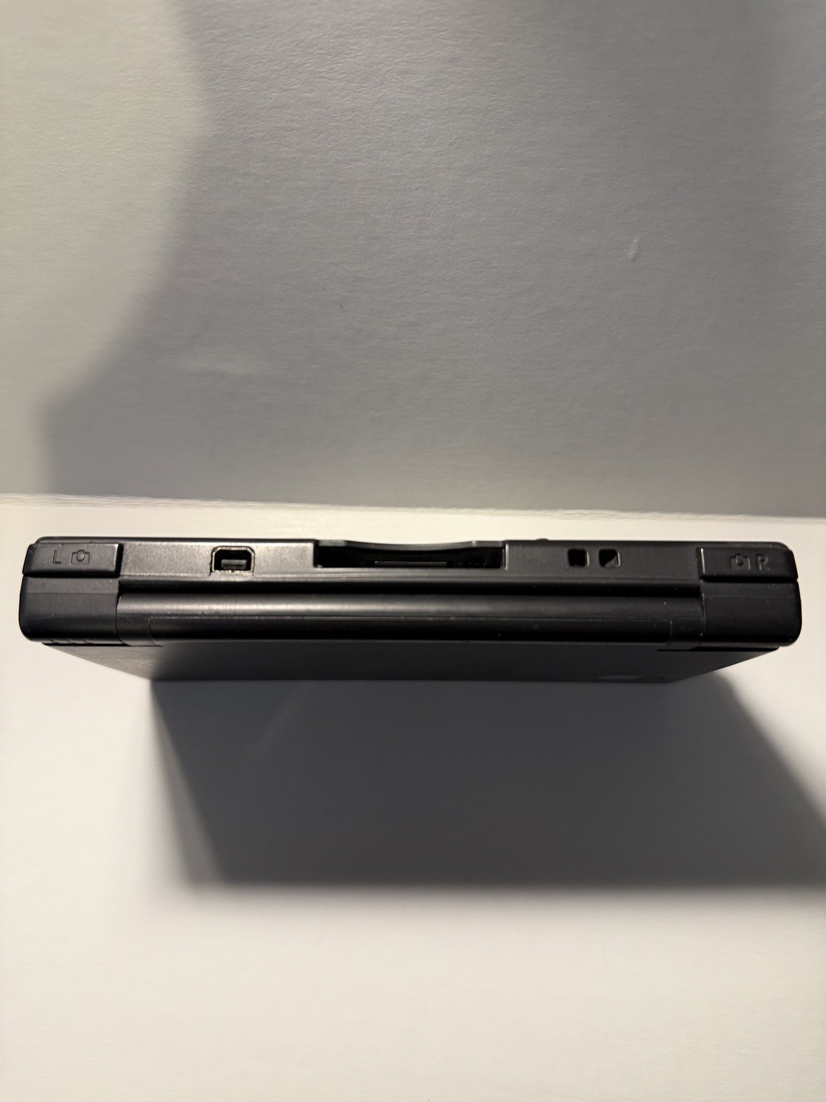 Tested Nintendo DSi Black System w/Charger Back R & L Buttons Do Not Work.