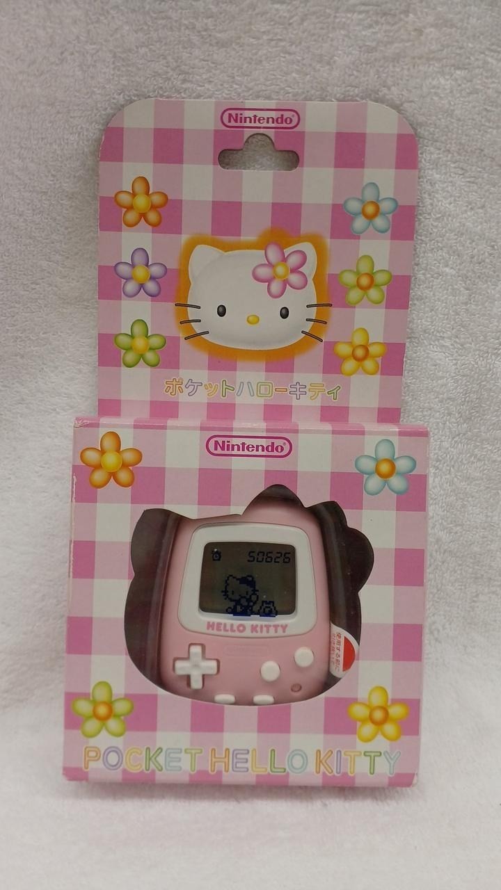 Nintendo Pocket Hello Kitty MPG-001 Unused Virtual Pet Game A2682