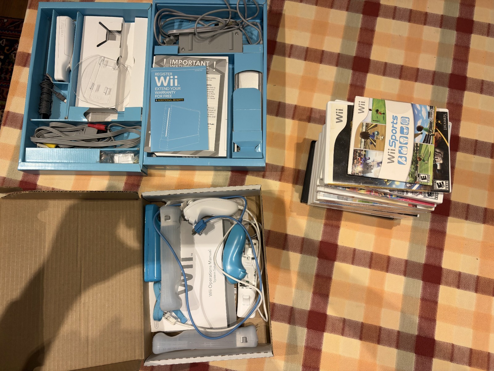 Nintendo Wii with assortment of games bundle – Original Packaging included
