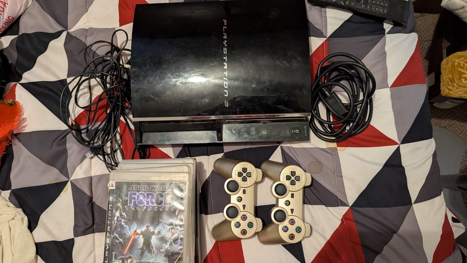 Sony PlayStation 3 PS3-40 GB-NTSC-U/C (US/Canada) with two controllers and games