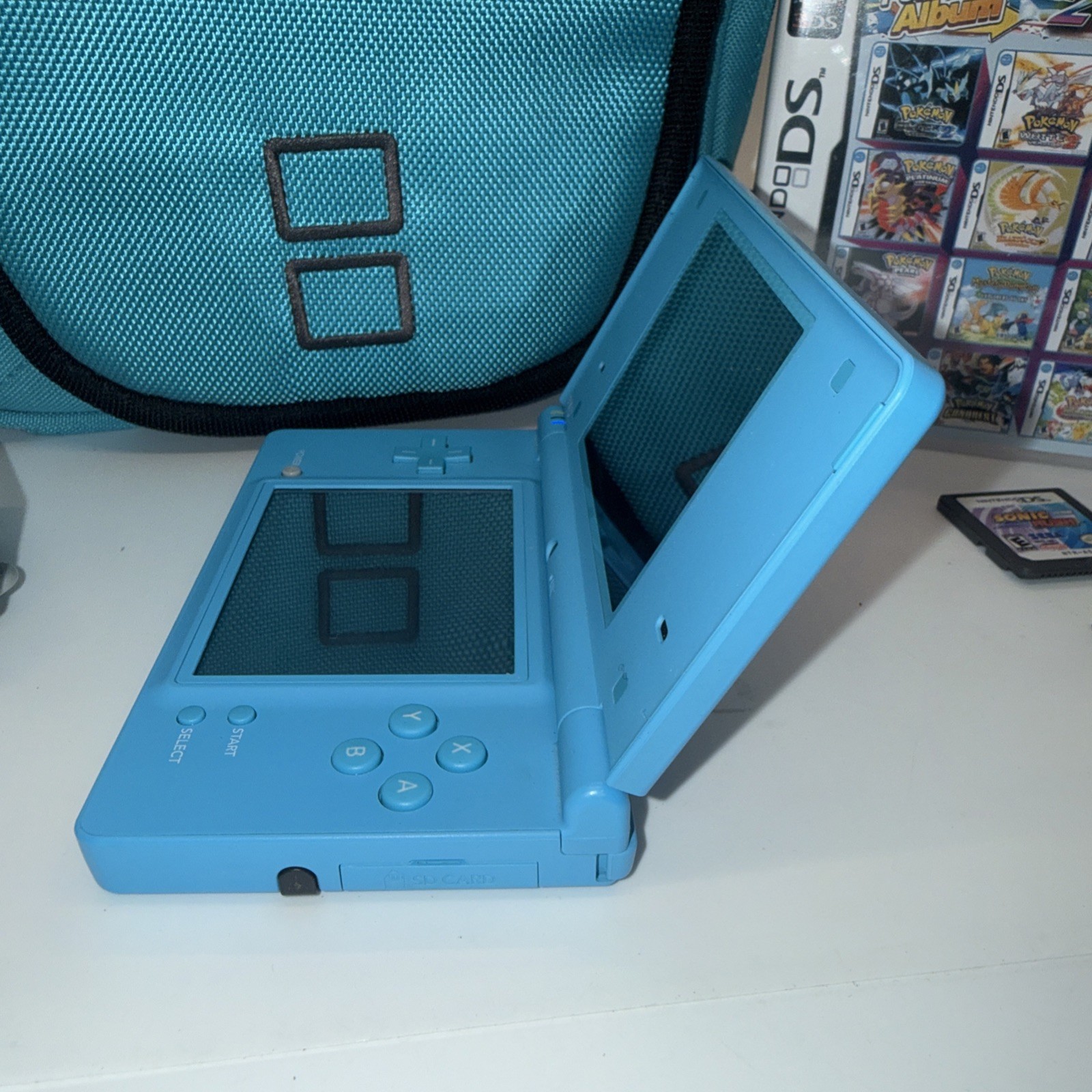 Nintendo Dsi Teal Light Blue Case Charger 4 Games Pokemon Album 23 In 1