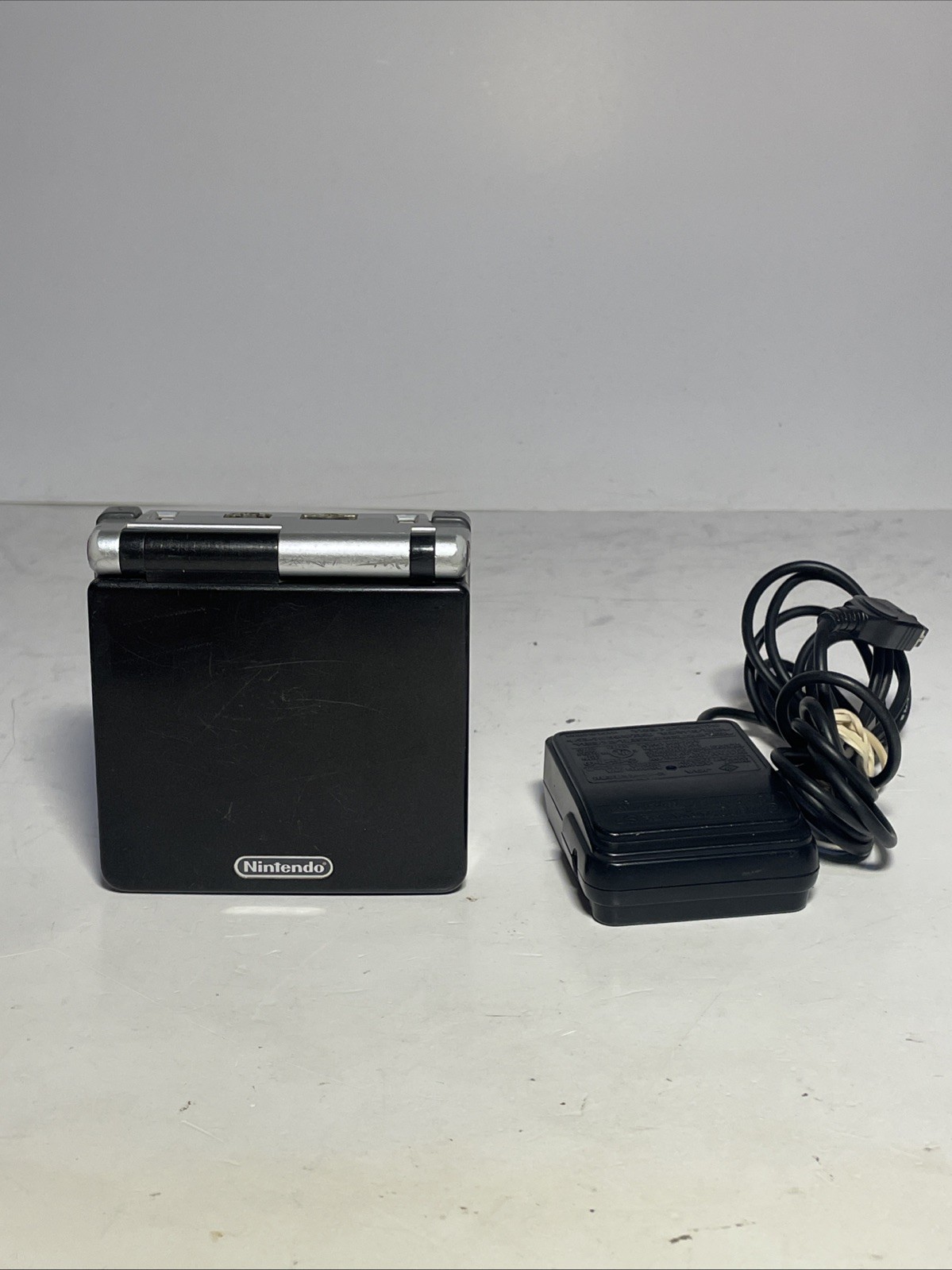 Nintendo Game Boy Advance SP Handheld System – Black and Silver TESTED Has Wear