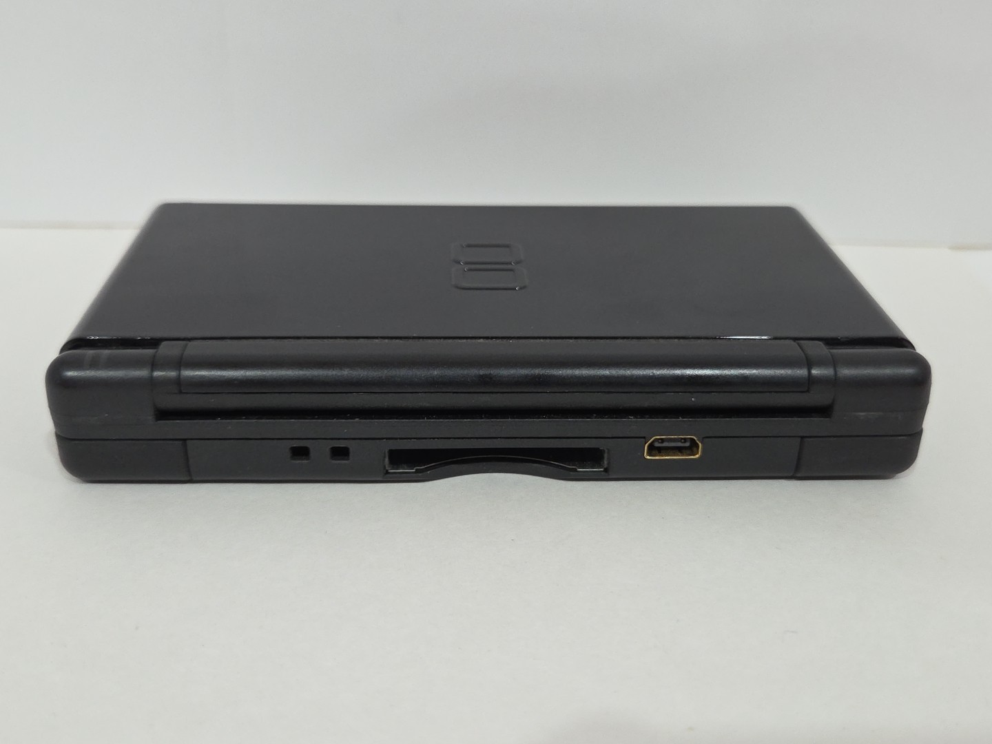 Nintendo DS Lite Console (Black) + 4 Games + Purple Case