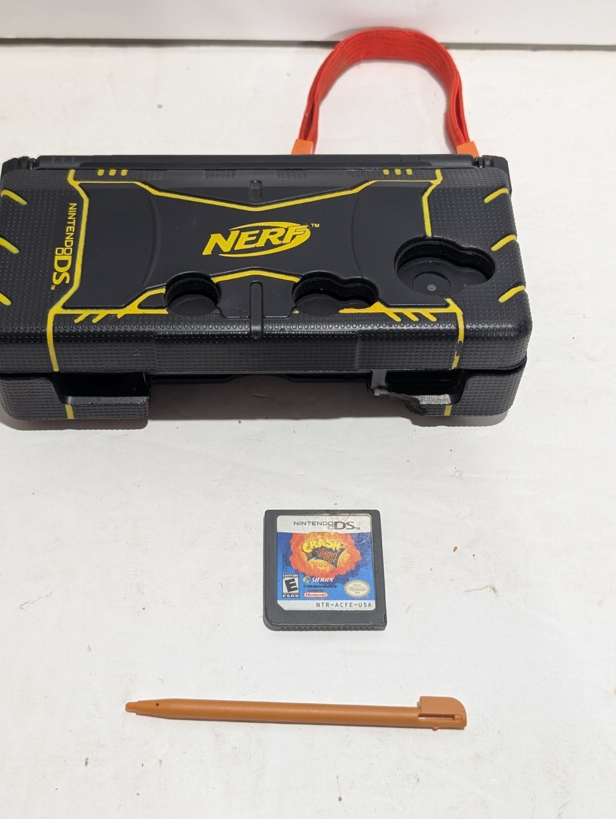 Nintendo DSi Bundle (DSi + NERF Case + Charger + Stylus + Game)