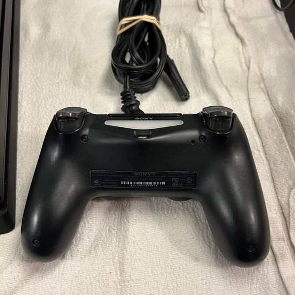 Sony PlayStation 4 Pro 1TB Console Black Bundle + 4 Games