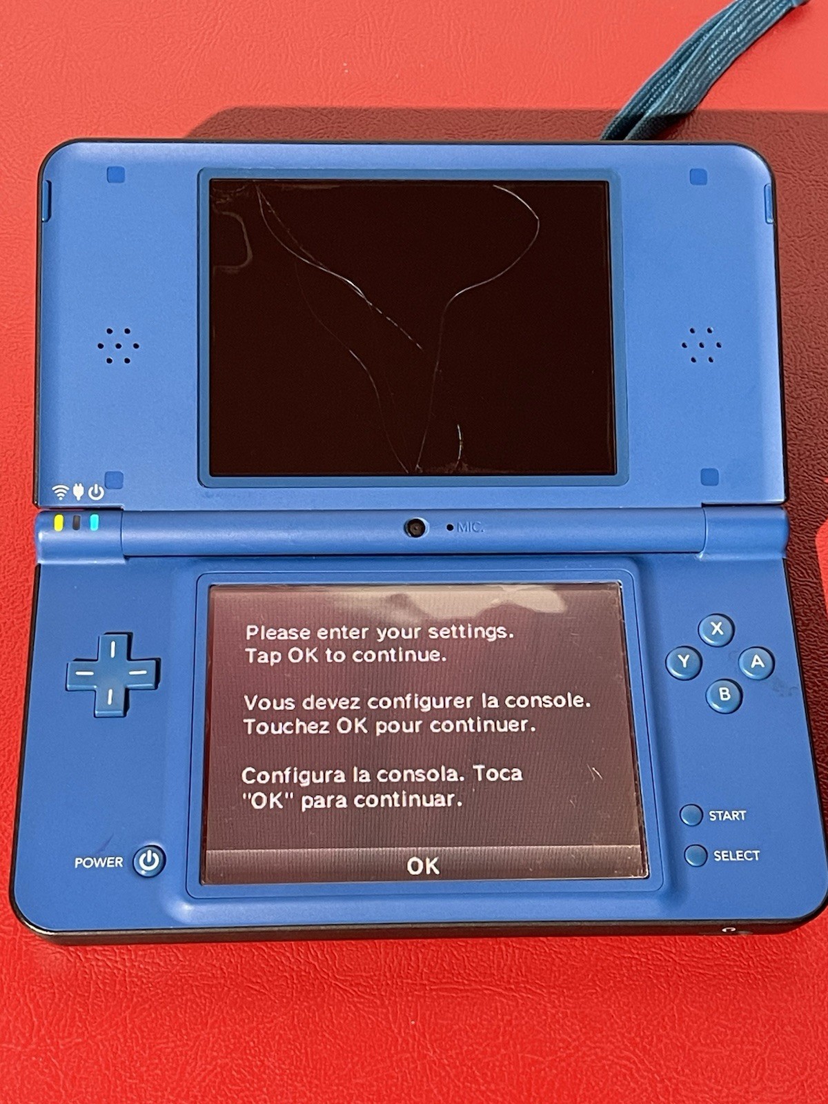 NINTENDO DSI XL BLUE FOR PARTS OR REPAIR NOT WORKING CRACKED SCREEN