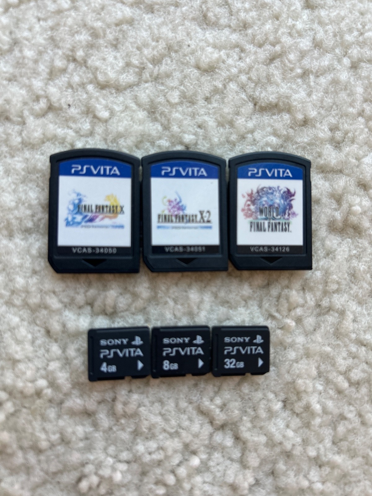 Playstation PS Vita PCH-1001 OLED White Console w/3 Memory Cards+8 Games READ