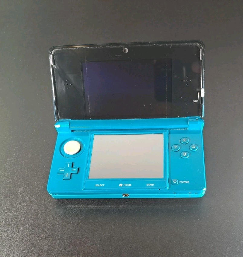 Nintendo 3DS Aqua Blue Handheld Console 3D Technology w/ Nyko Powerpak & 4GB SD