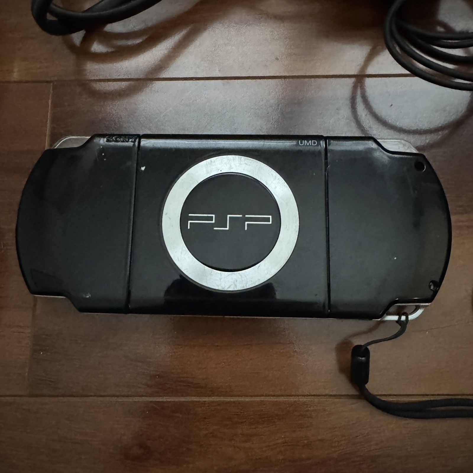 PSP 2001 Piano Black Console Powers On *Includes cables* – No Battery