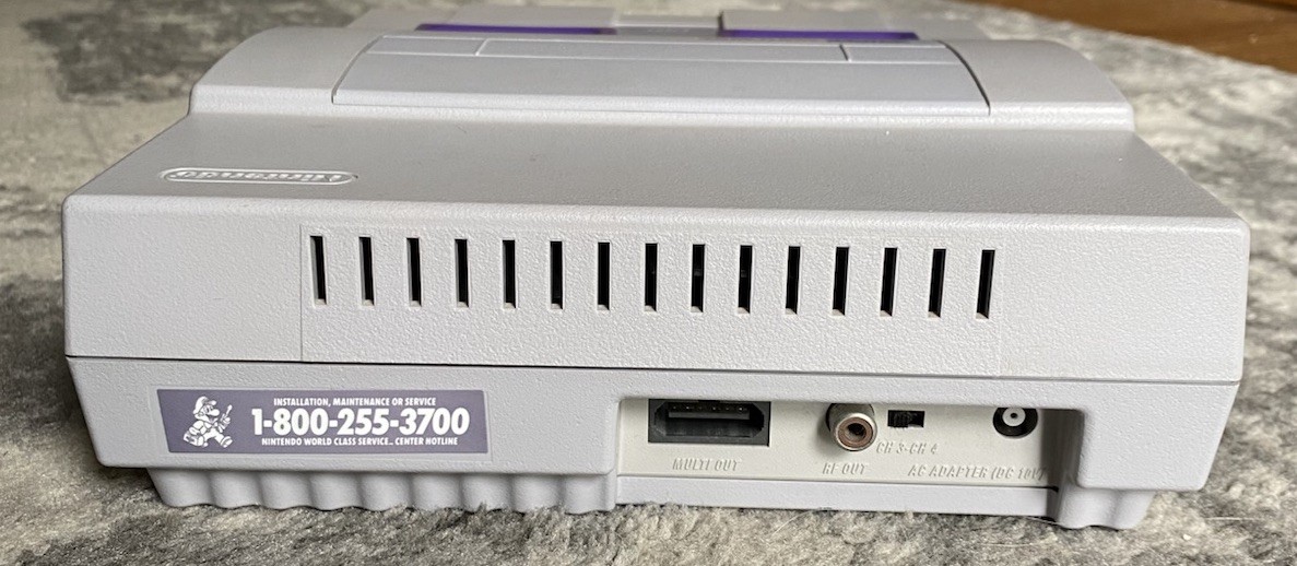 Super Nintendo SNES Console w/ OEM Controllers + Mario World + Manuals