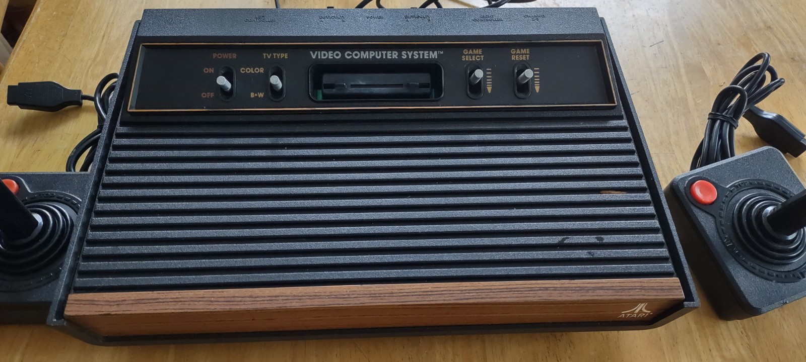 Atari 2600 Vintage Game Console Woodgrain Complete and with Adapter and 3 Games