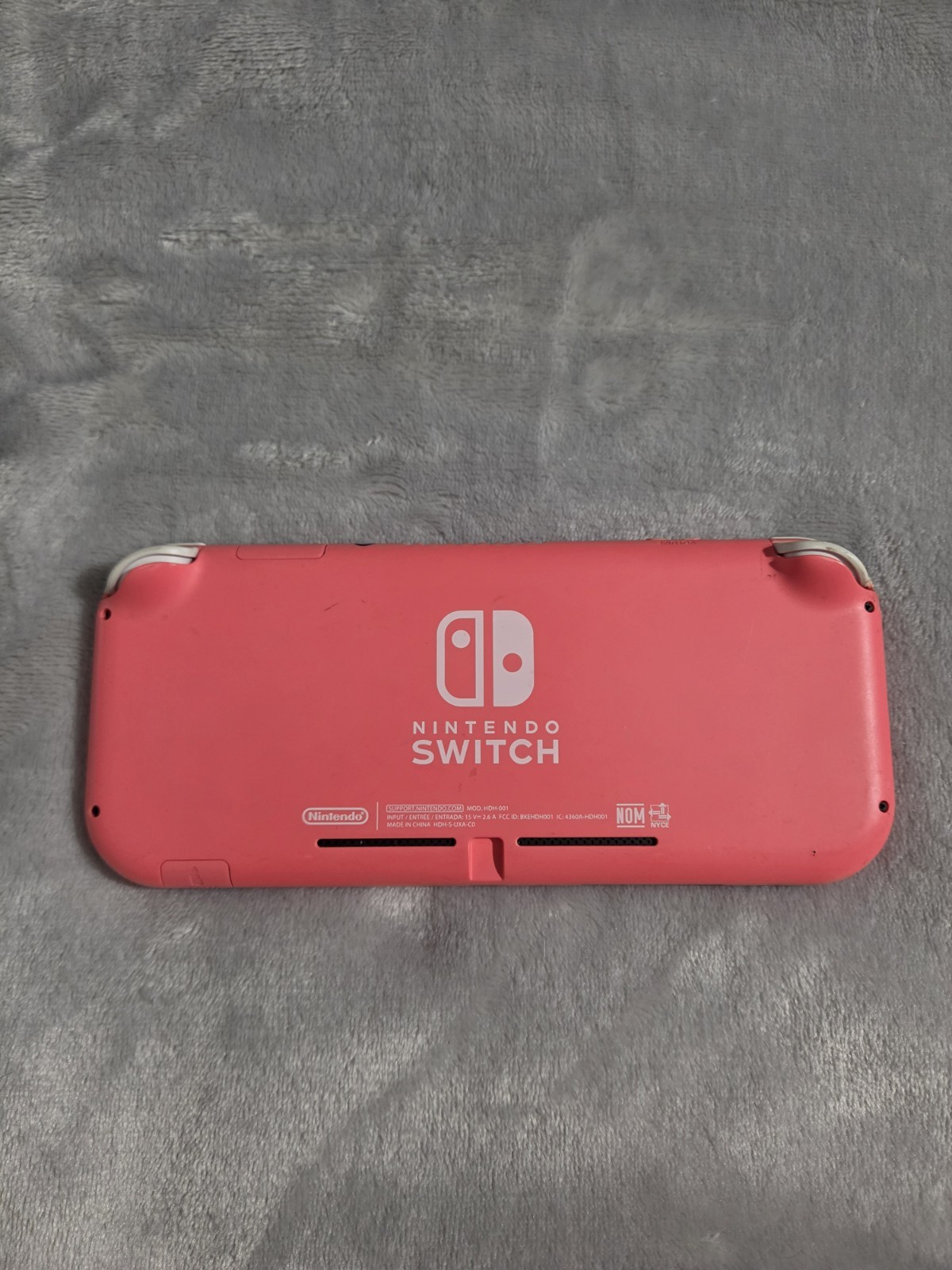 Nintendo Switch Lite Coral with Bratz, Monster High, & Peppa Pig Games, Charger