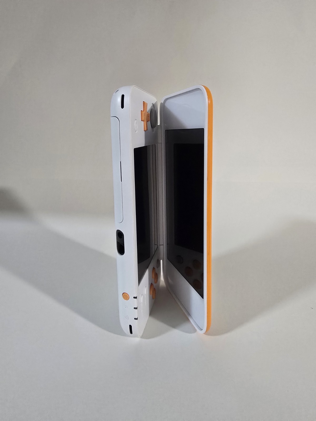 Nintendo 2DS XL Console – White/Orange + Game Cartridge