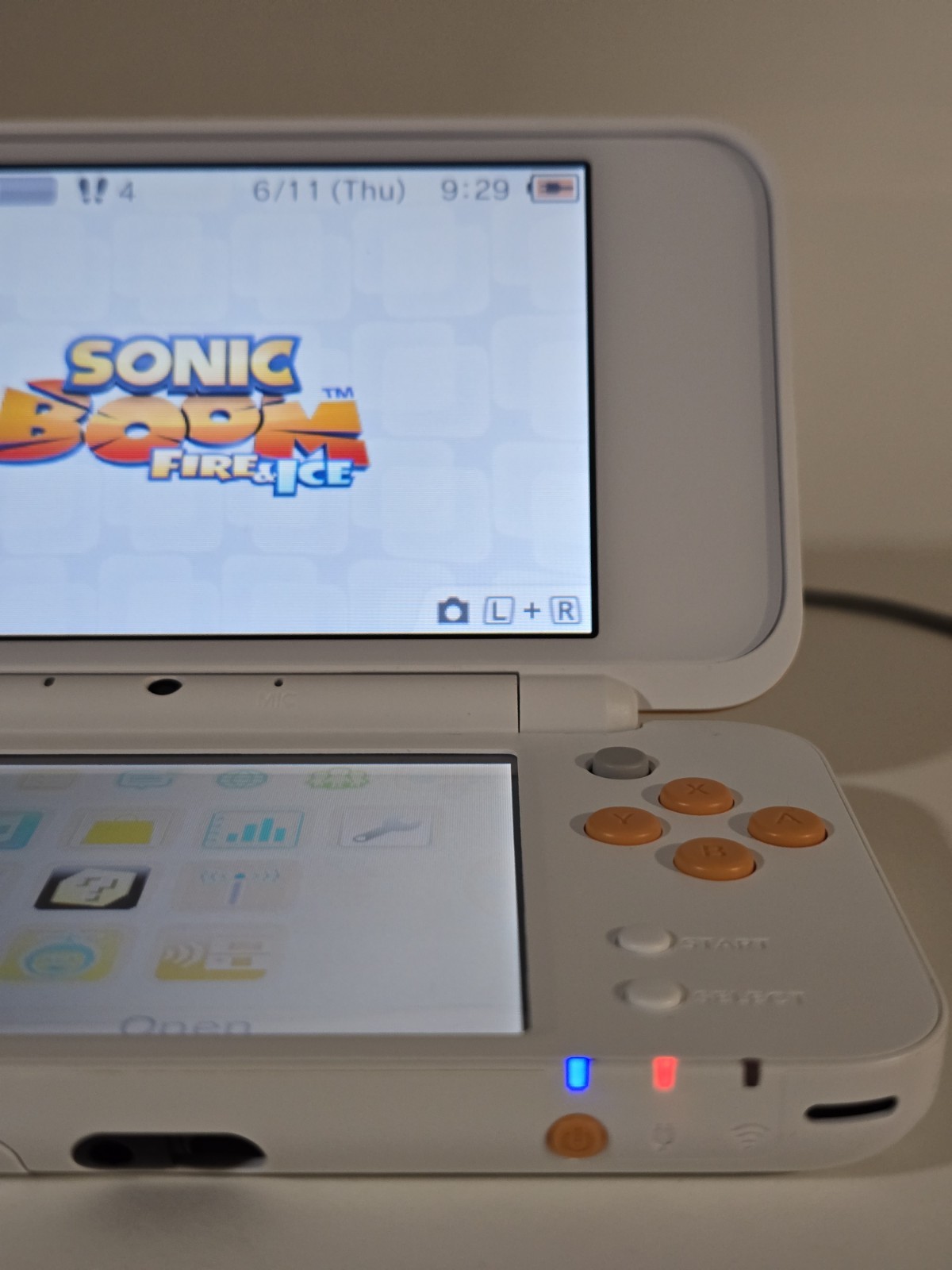 Nintendo 2DS XL Console – White/Orange + Game Cartridge