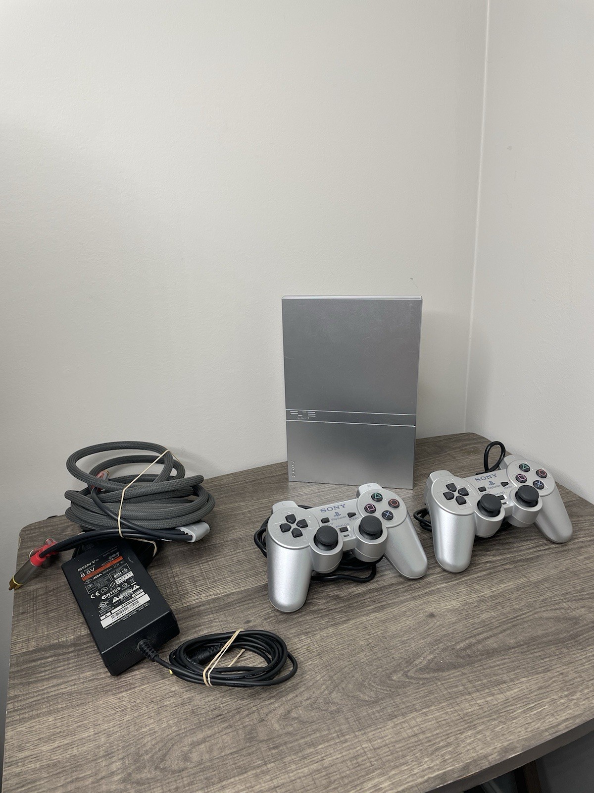 Sony PlayStation 2 PS2 Slim Console Silver With Matching Two Controllers