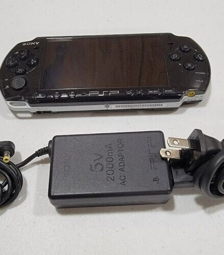 Excellent – Official Sony Black PSP 3000 with upgraded battery and charger