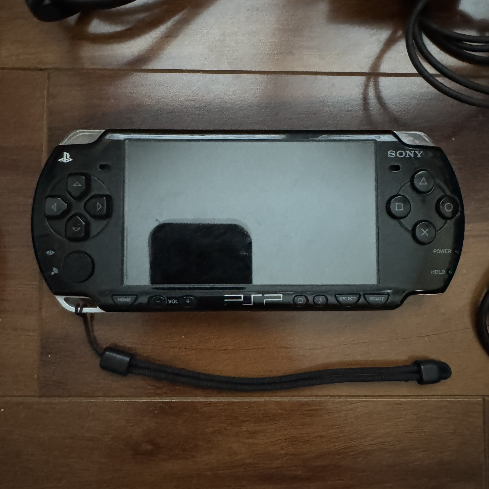 PSP 2001 Piano Black Console Powers On *Includes cables* – No Battery