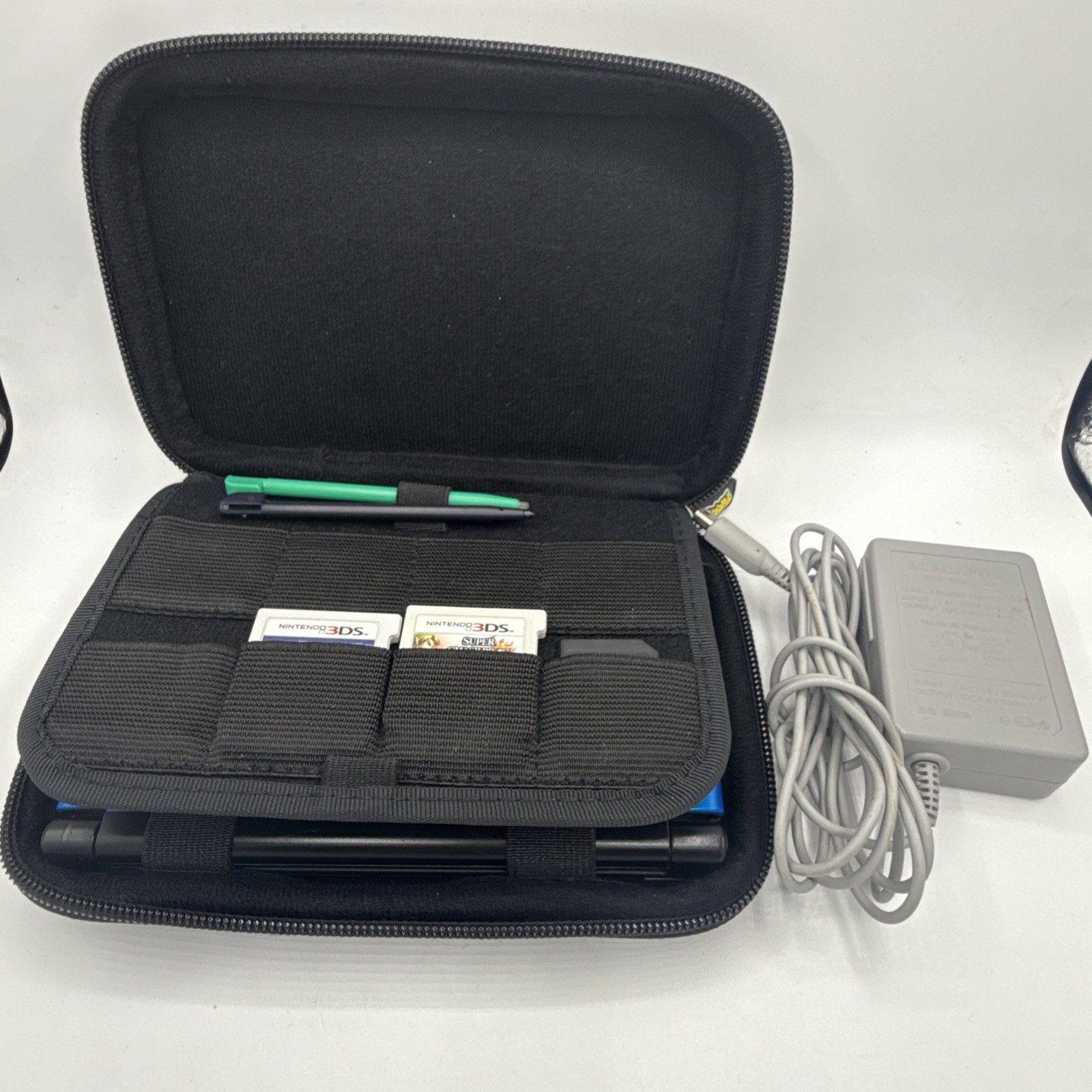 Nintendo 3DS XL Blue Console Bundle: Case, Charger, 4GB SD Card, Stylus, 2 Games