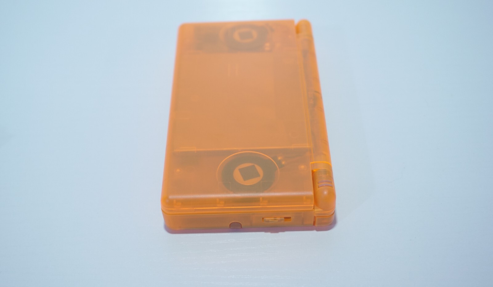 Nintendo DS Lite Transparent Clear Orange Handheld System with Charger & Stylus