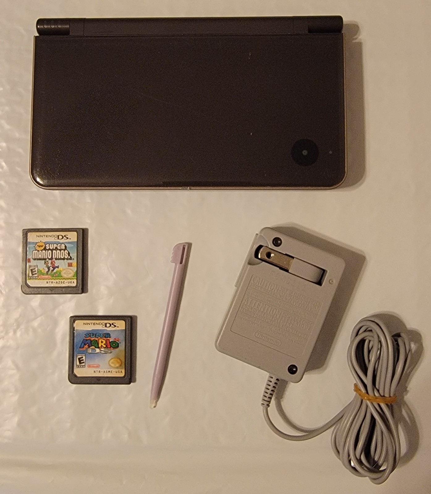 Nintendo DSi XL Bronze w/ Charger & 2 Games Mario 64 DS & New Super Mario Bros