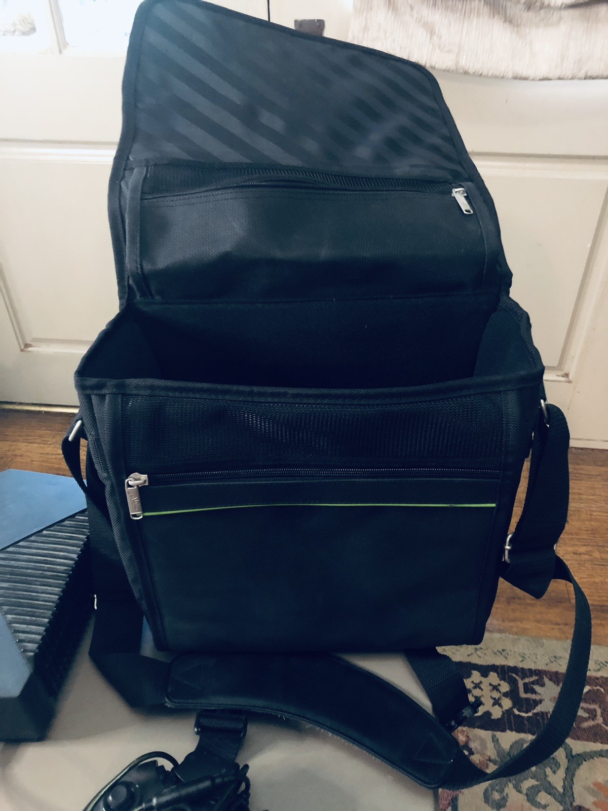 Xbox console, three controllers, carryting case, 2 games, and more