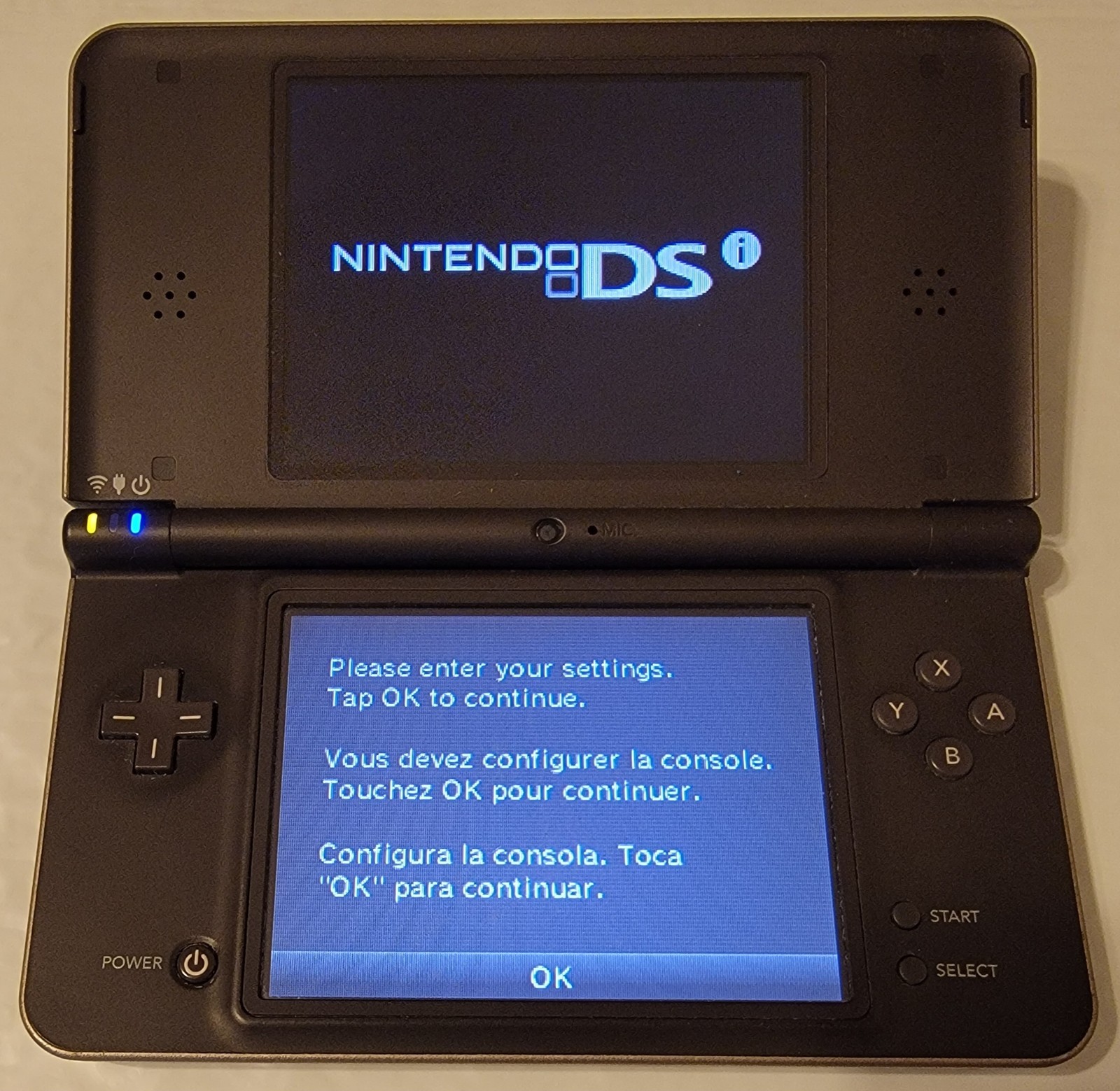 Nintendo DSi XL Bronze w/ Charger & 5 Games Mario 64 DS & New Super Mario Bros