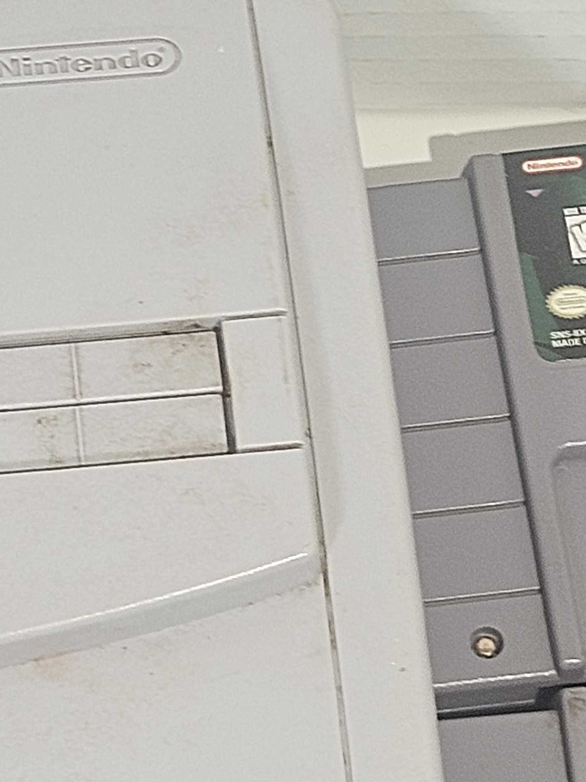 Super Nintendo SNES JR Console with 8 games, cords, and 1 controller