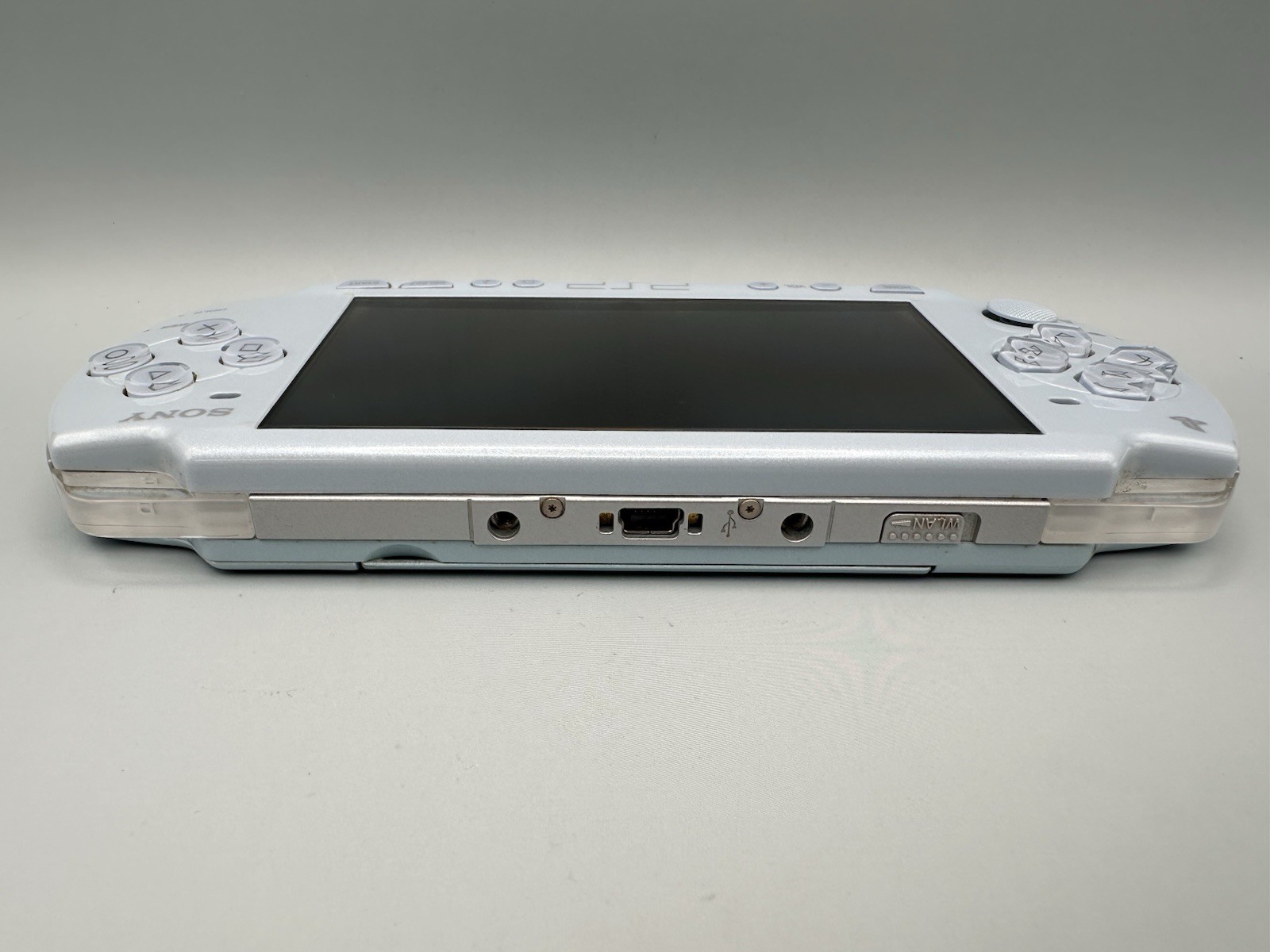 Sony PSP 2000 Console – Felicia Blue + New Battery + 2GB Memory Stick + Charger