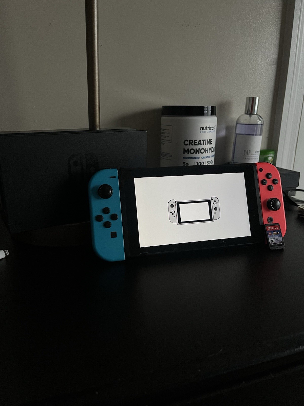 Nintendo Switch 32GB Handheld Console Neon Red/Neon Blue (Marvel game included)