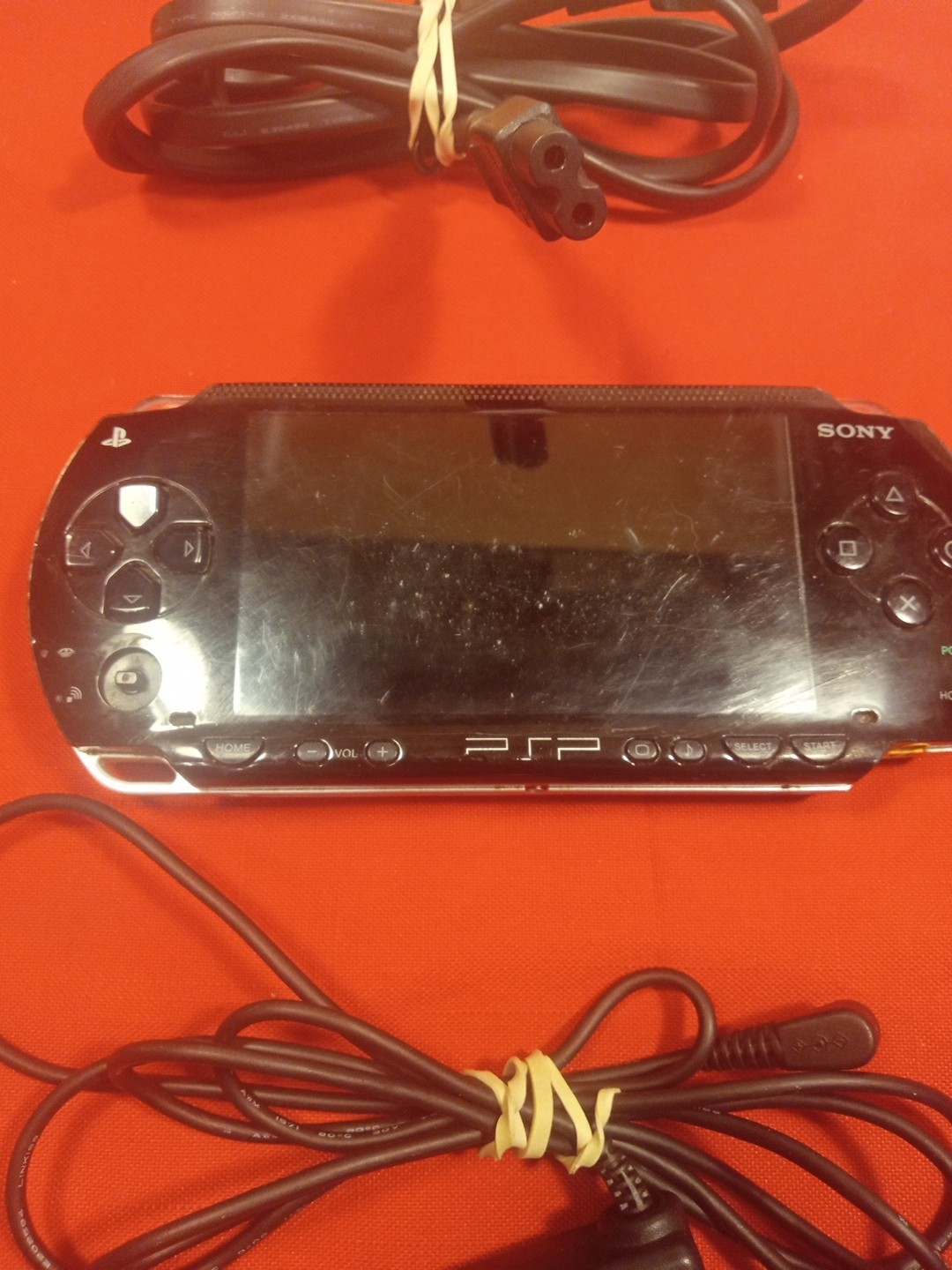 PSP 1001 CONSOLE+AC ADAPTER/NO TOGGLE BUTTON OR BATTERY & COVER/ SEE…
