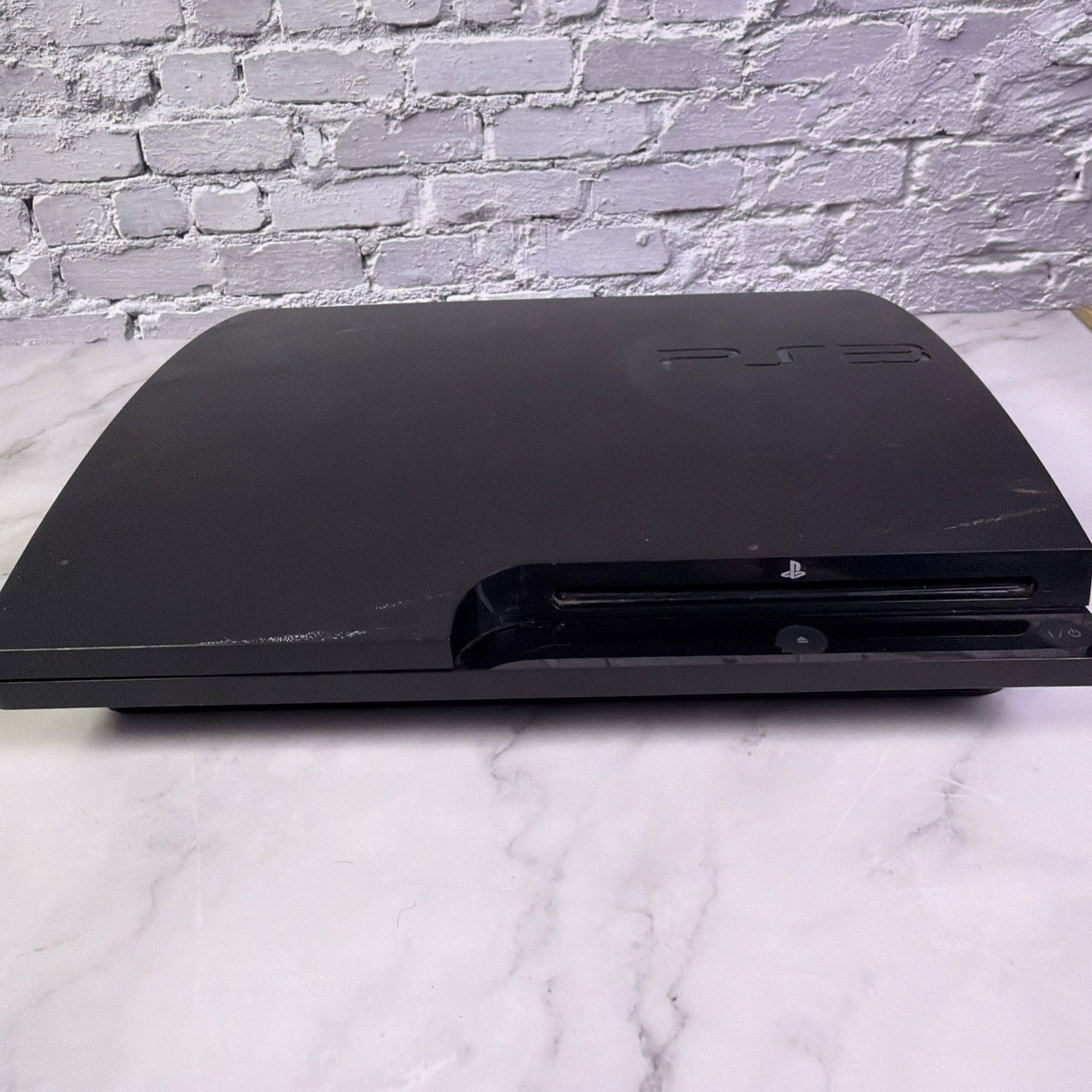Sony PlayStation 3 Slim 160GB CECH-3001B, PS4 Controller & 8 Games – Tested ✅
