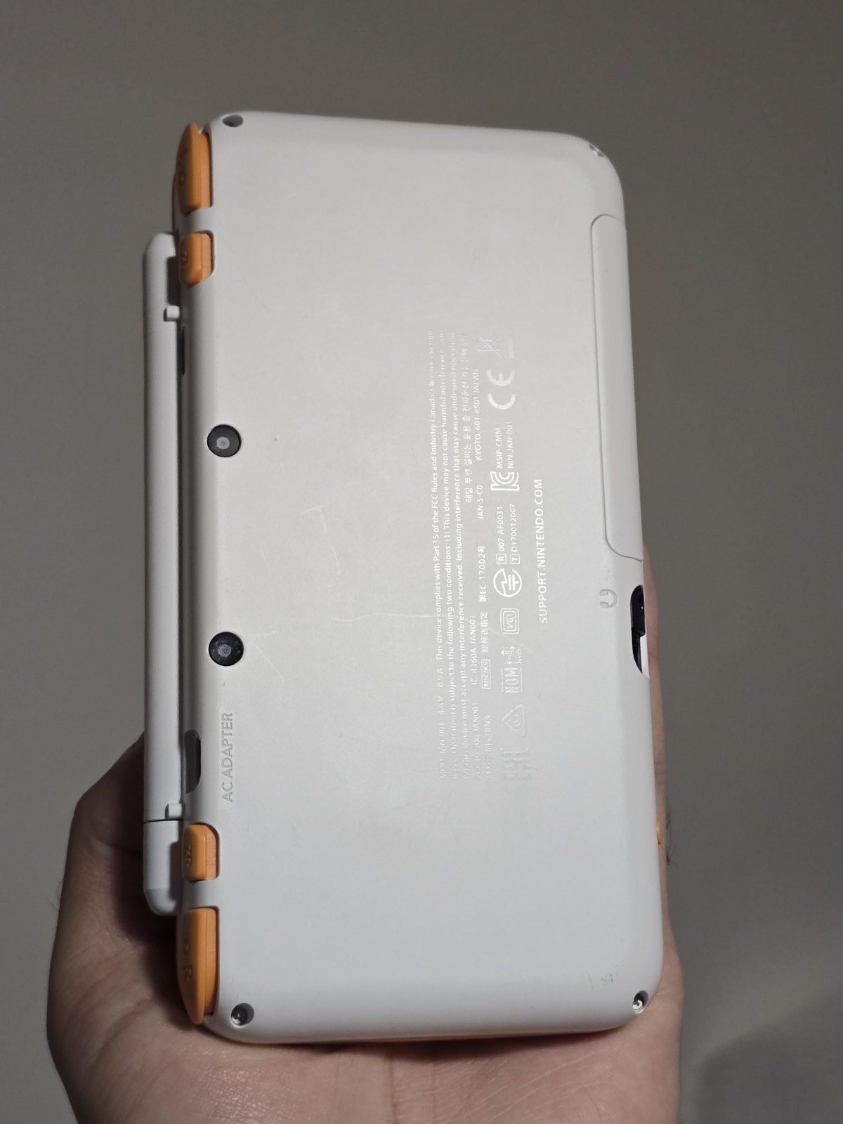 Nintendo 2DS XL Console – White/Orange + Game Cartridge