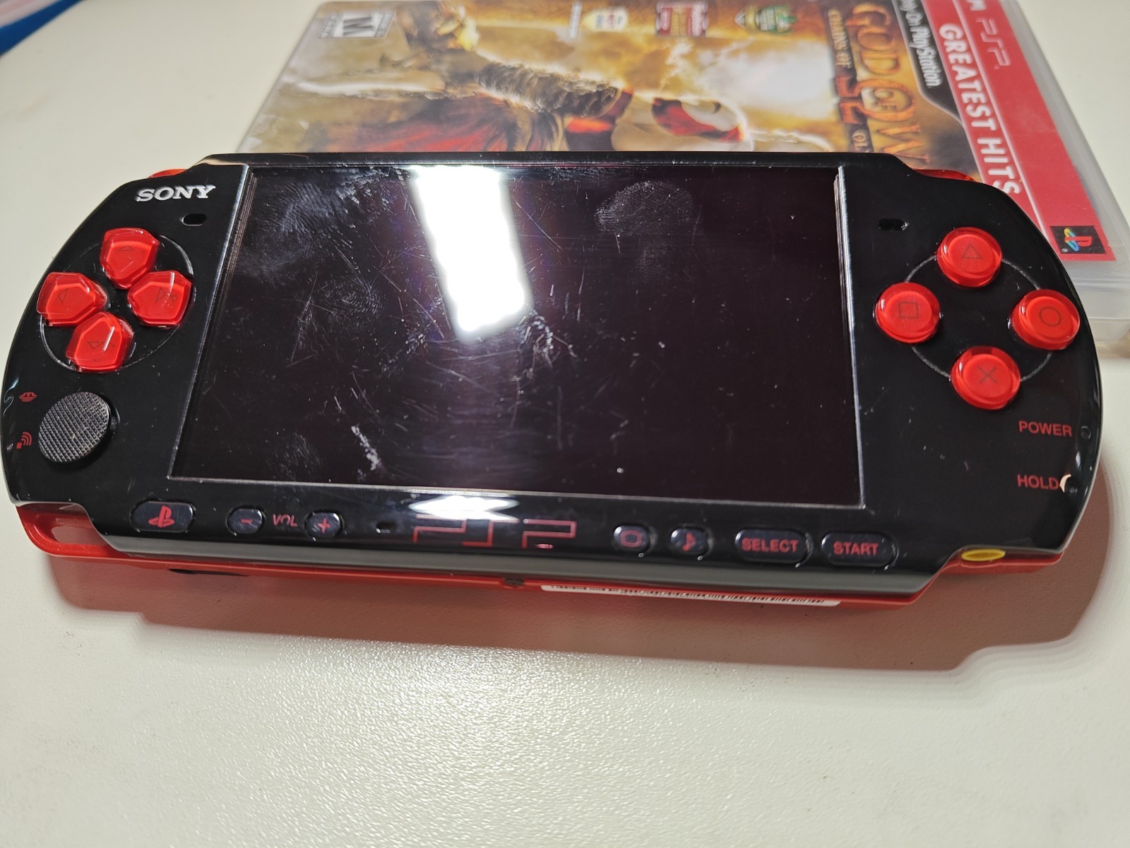 Sony PSP 3001 God of War Red & Black *NO Battery Or Charger*+ Game. Tested Works