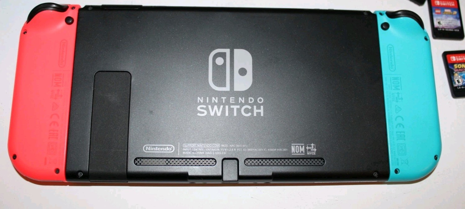 Nintendo Switch Console Model HAC-001(01) Bundle w/ 3 Games, Carrying Case, Extr