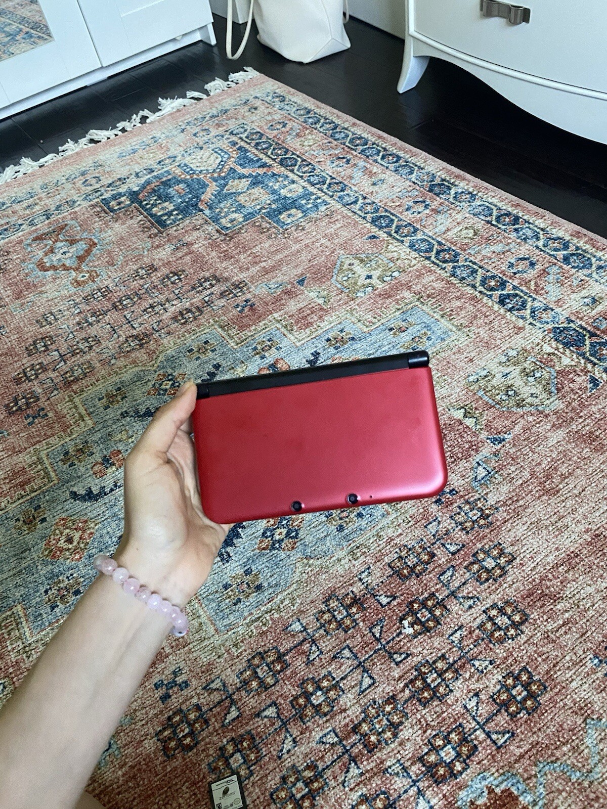 Red Nintendo 3DS XL with 3 games, charger not included