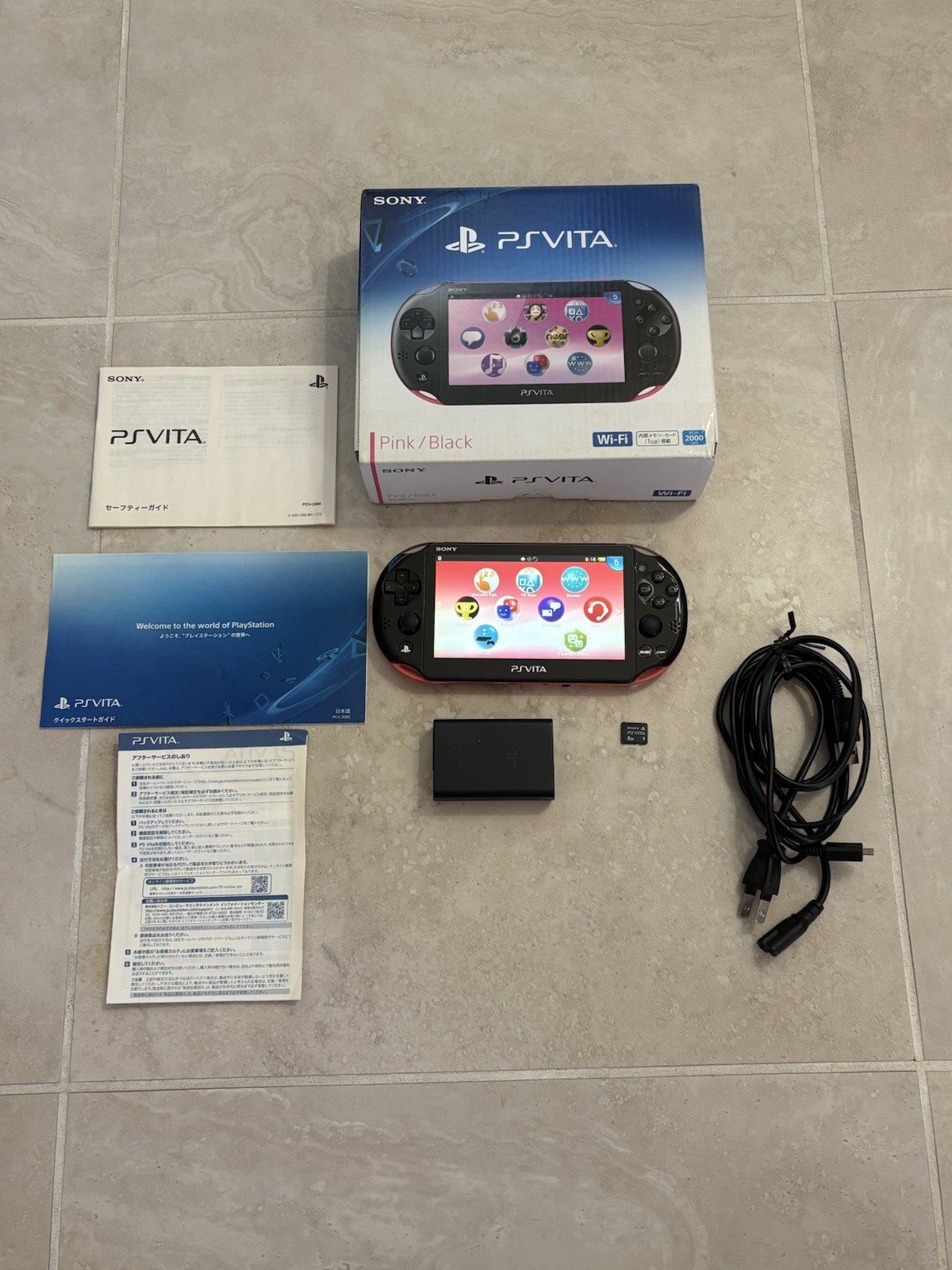 Sony PS Vita PCH-2000 Complete In Box – Pink and Black 8GB Very Good Condition