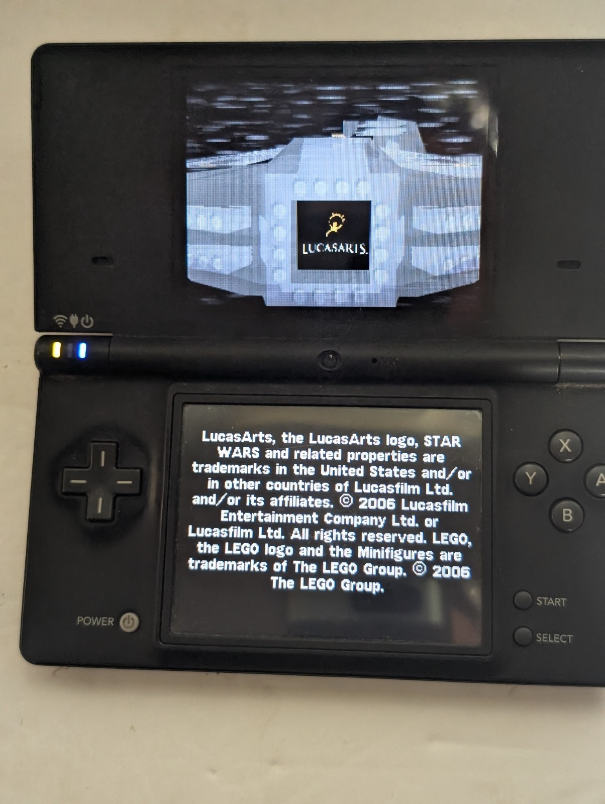 Nintendo DSi Black Console + Charger + Stylus + LEGO Star Wars II–Tested Working