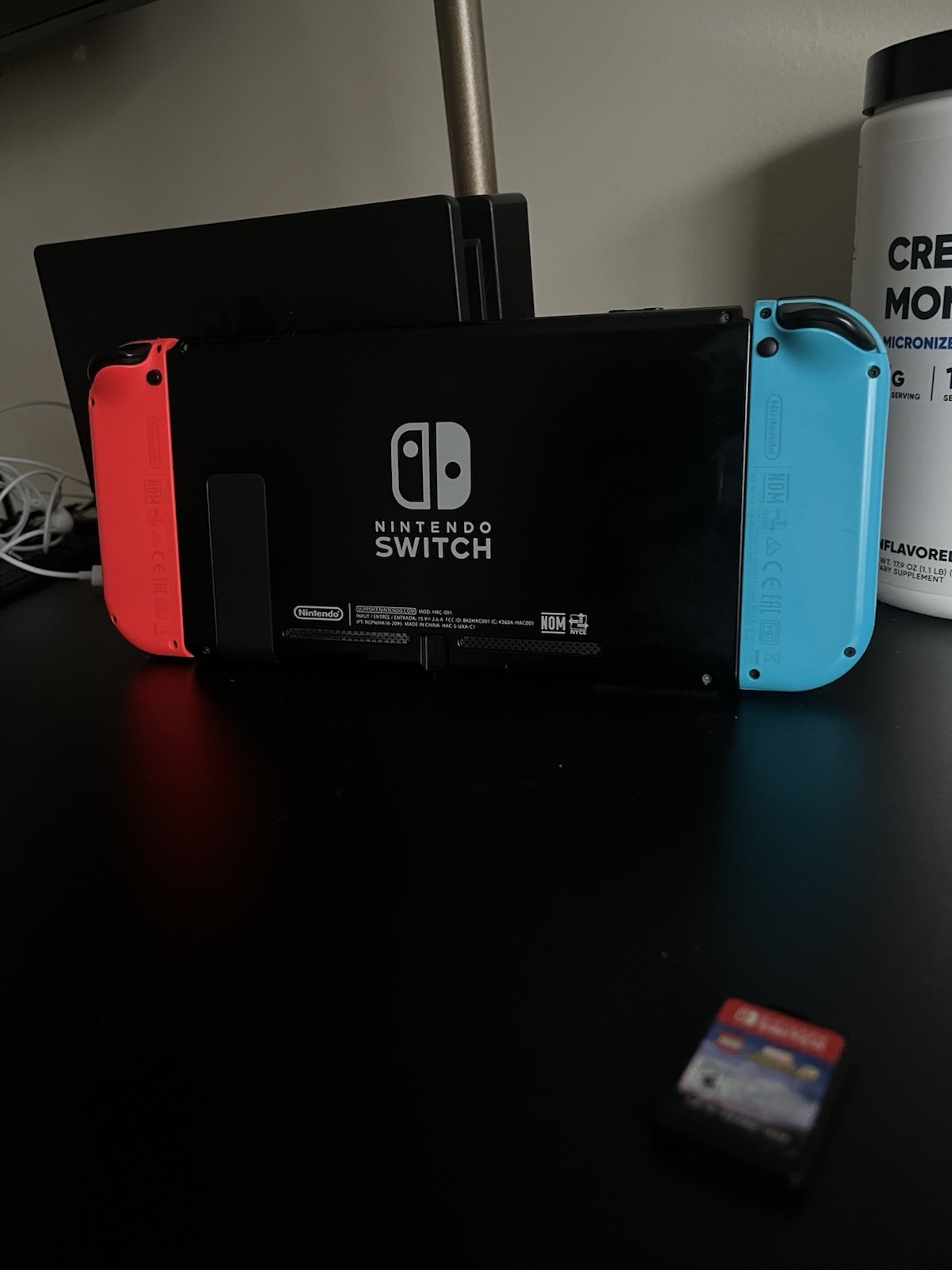 Nintendo Switch 32GB Handheld Console Neon Red/Neon Blue (Marvel game included)
