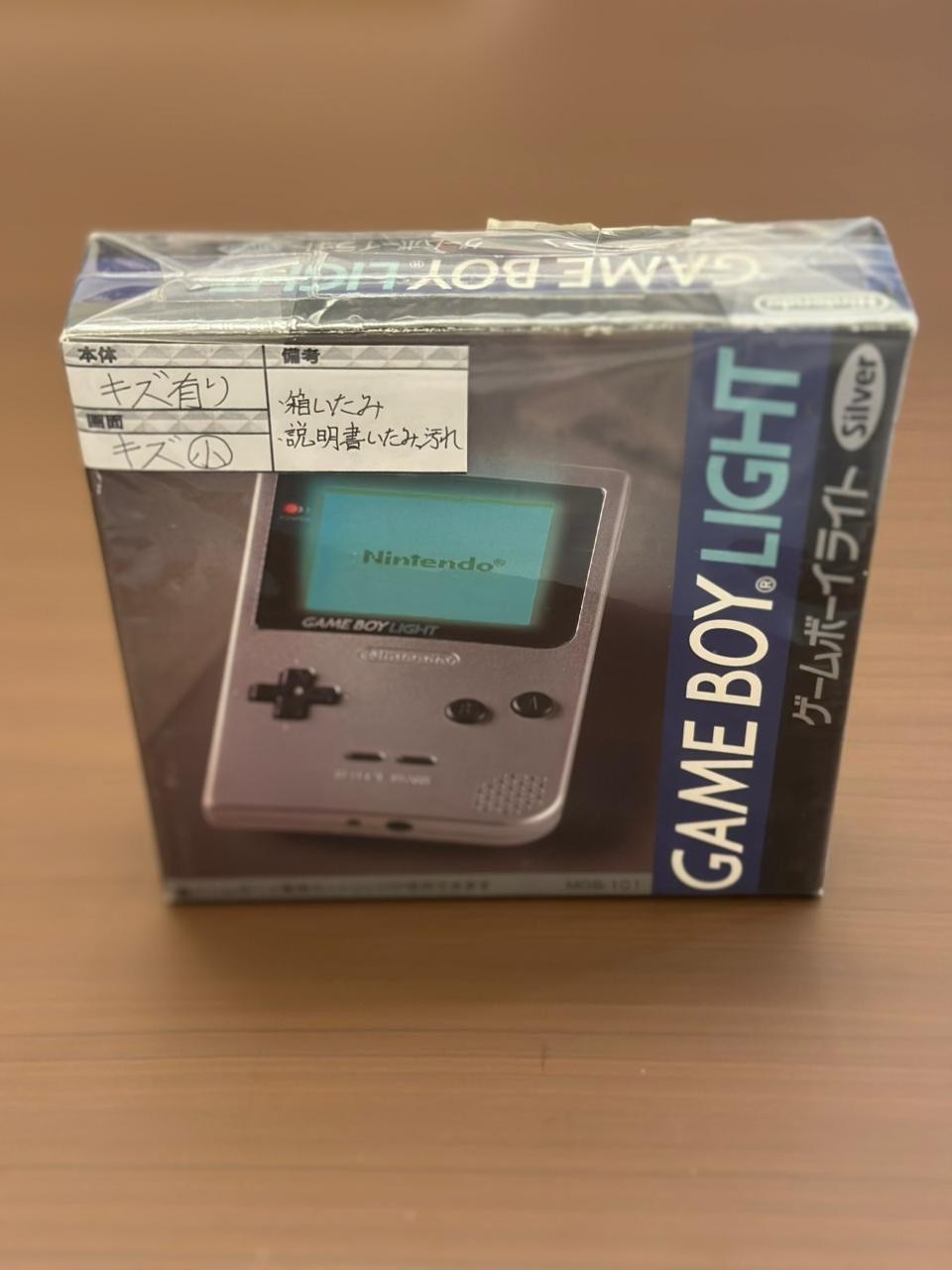 Nintendo Game Boy Light Launch Edition Silver , Sealed . with old invoice